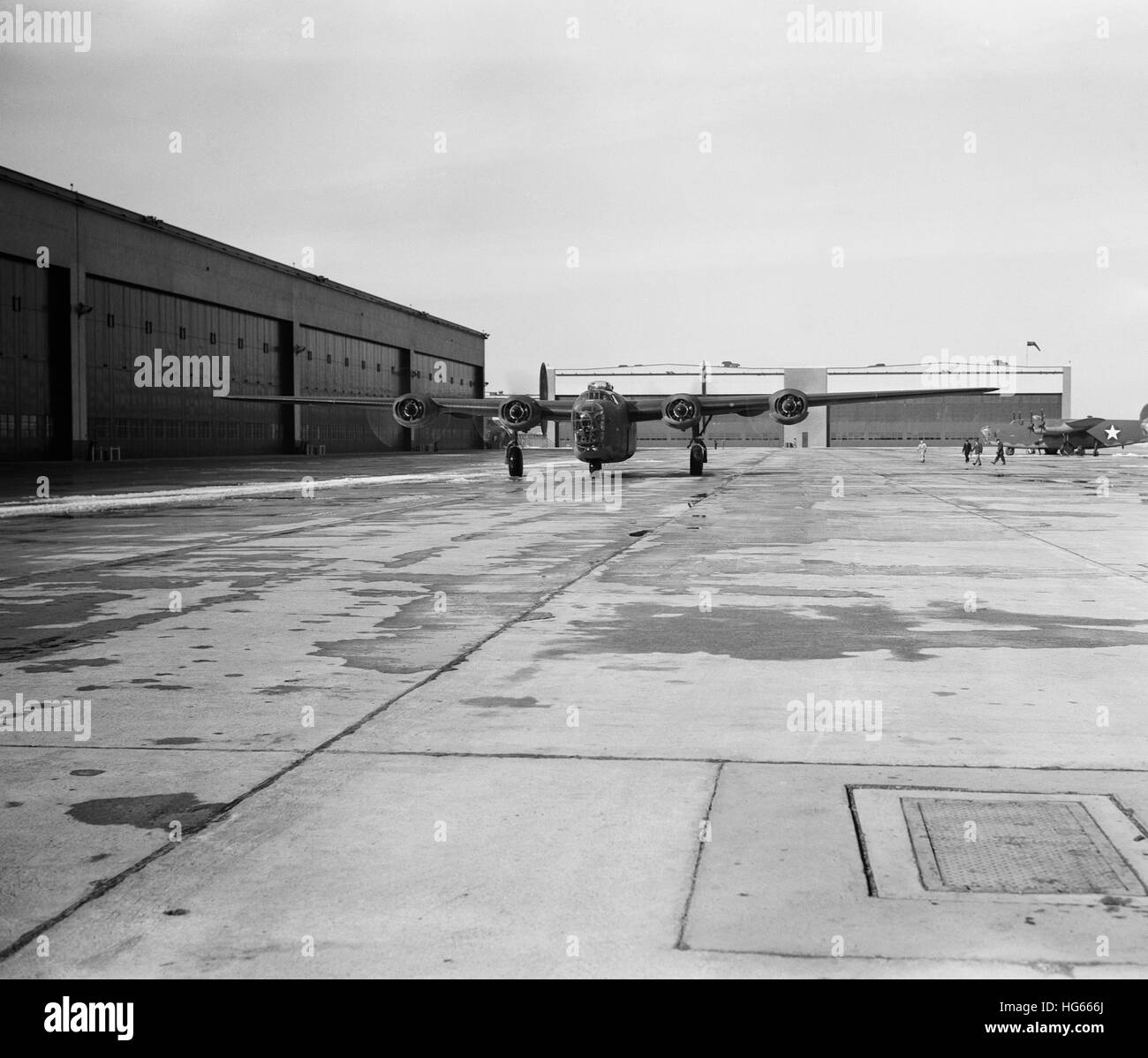 A B-24E Liberator bomber taxiing down a runway, circa 1942/1943. Stock Photo