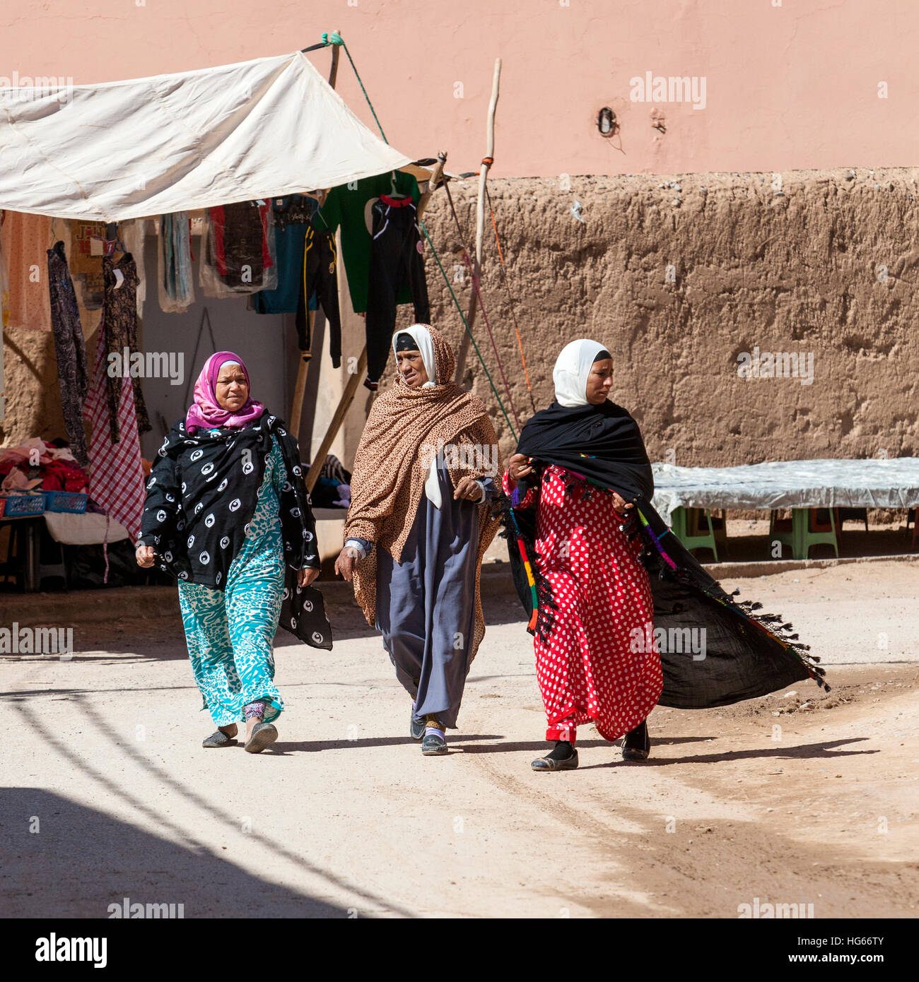 Elkhorbat, Morocco.  Berber Women Walking in the Market. Stock Photo