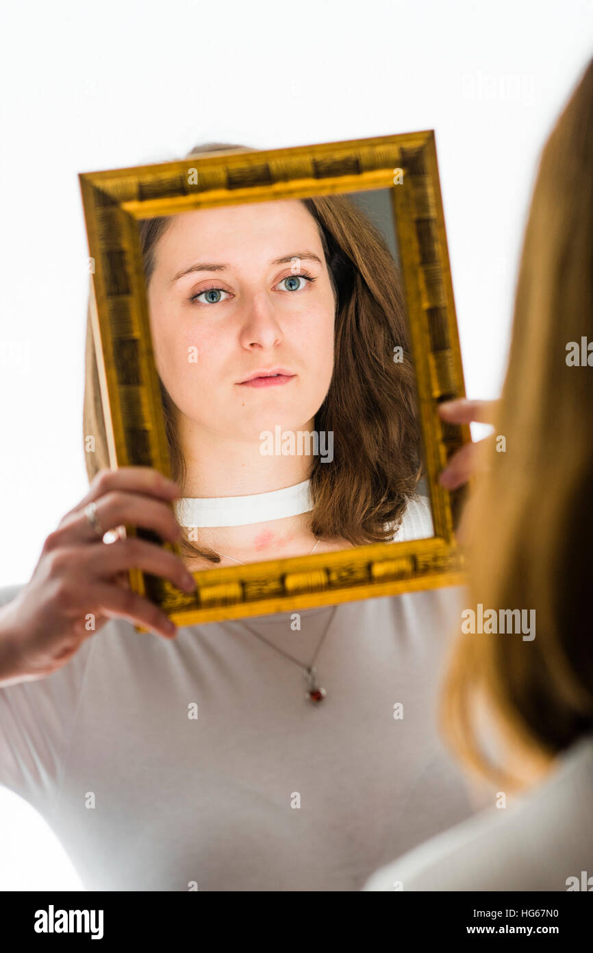 Reflections mirror face woman hires stock photography and images Alamy