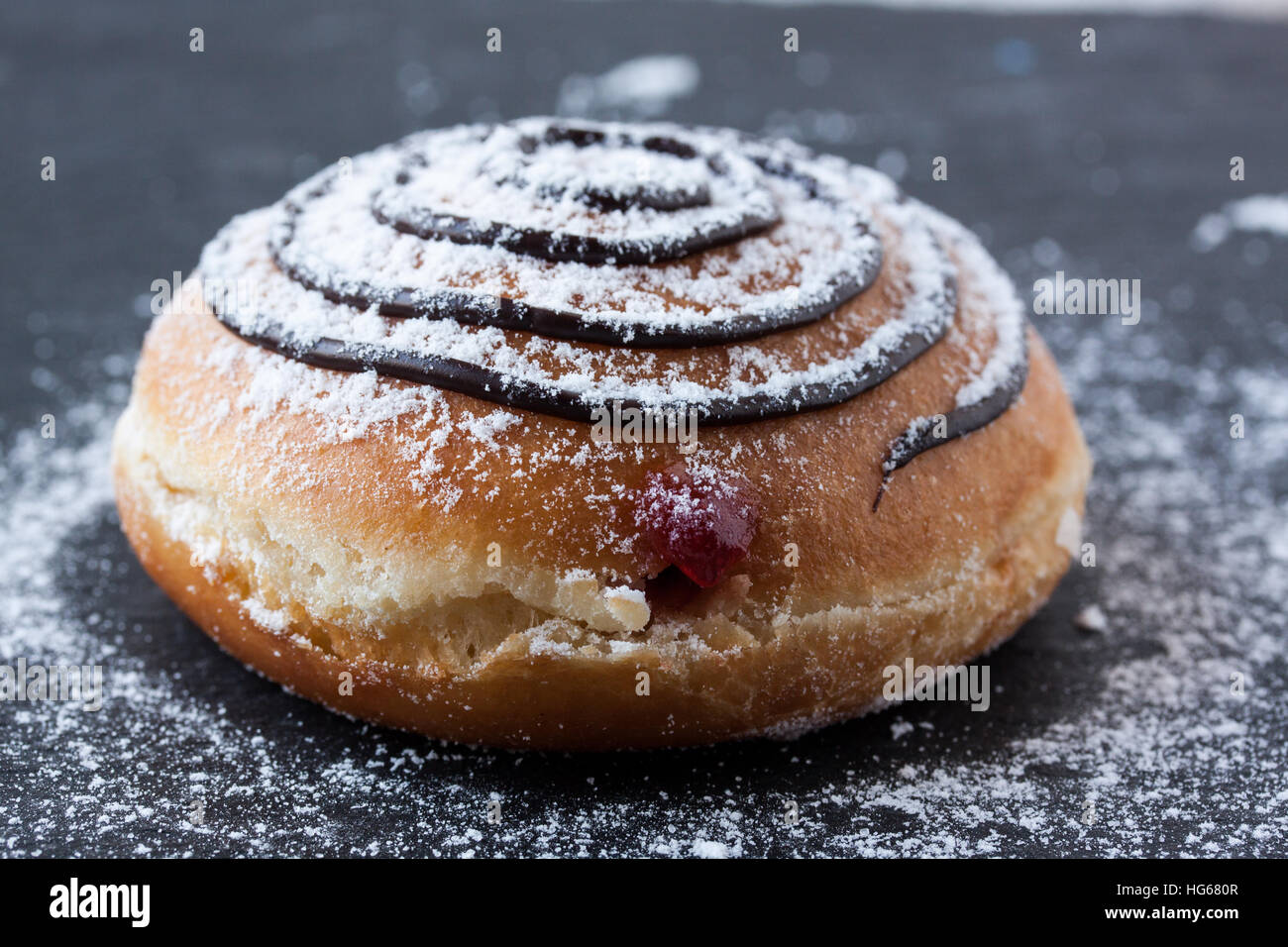 donut berliner with marmalade and chocolate Stock Photo