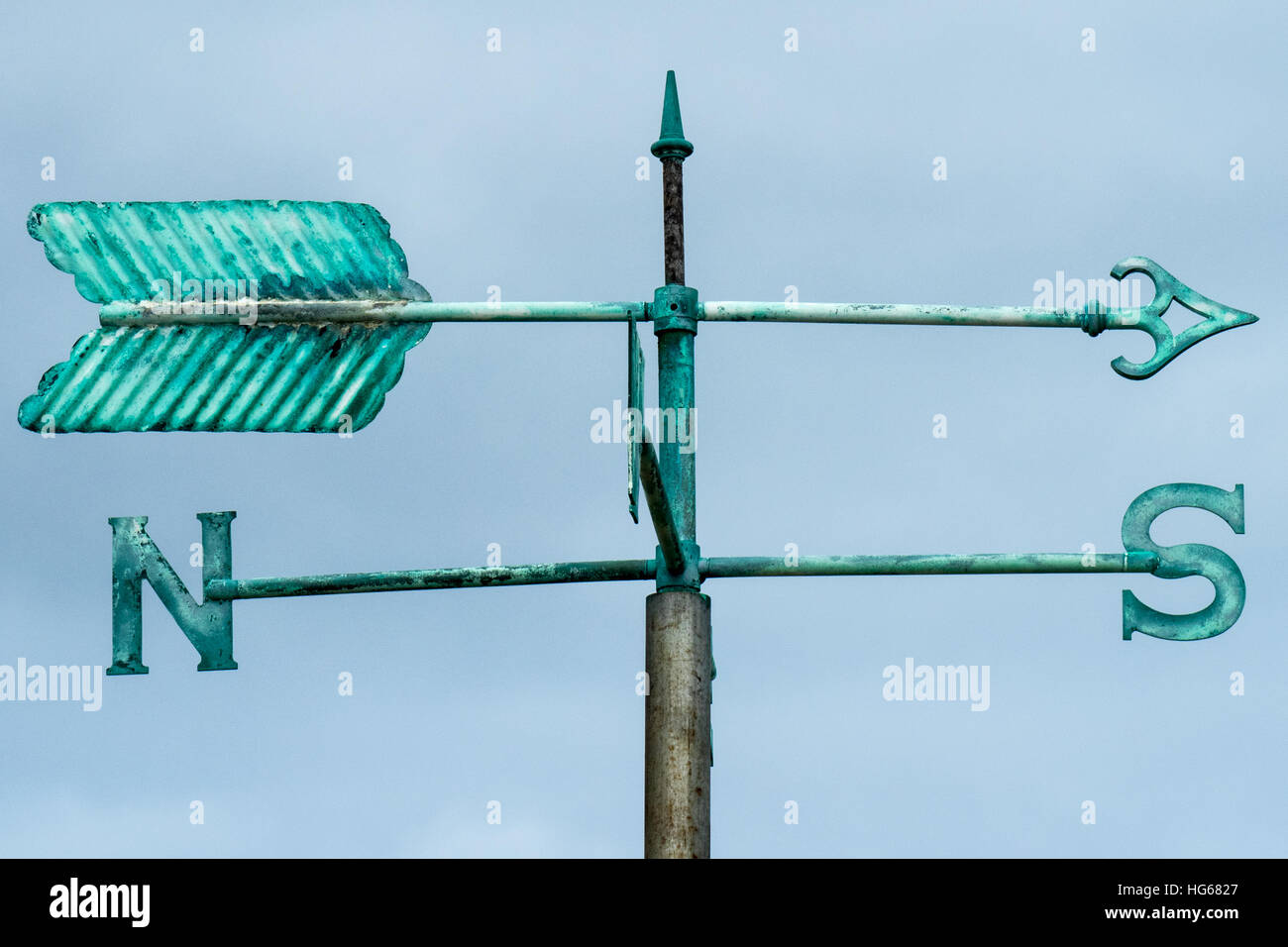 A copper weather vane pointing south Stock Photo Alamy