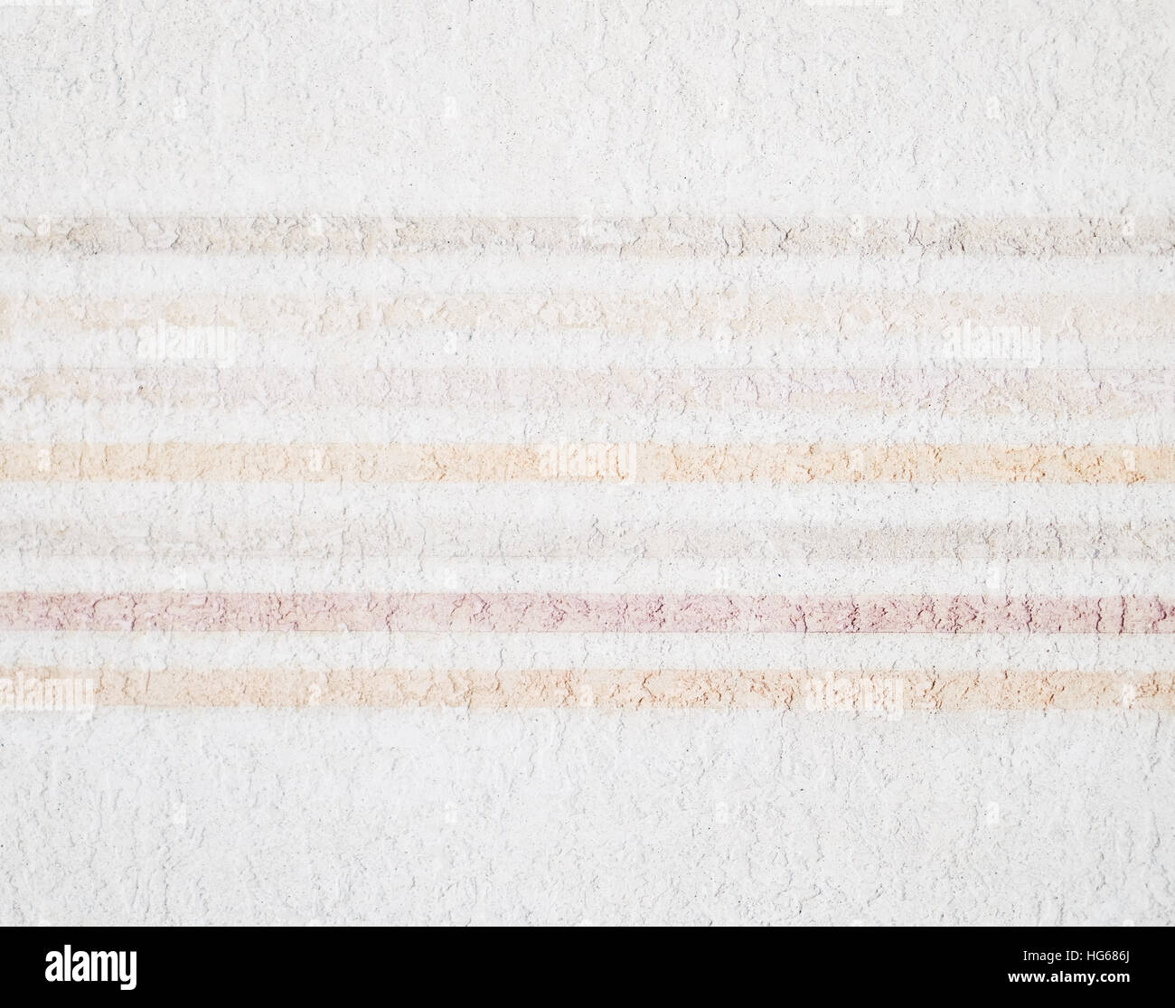 Pastel colors painted lines on plaster Stock Photo