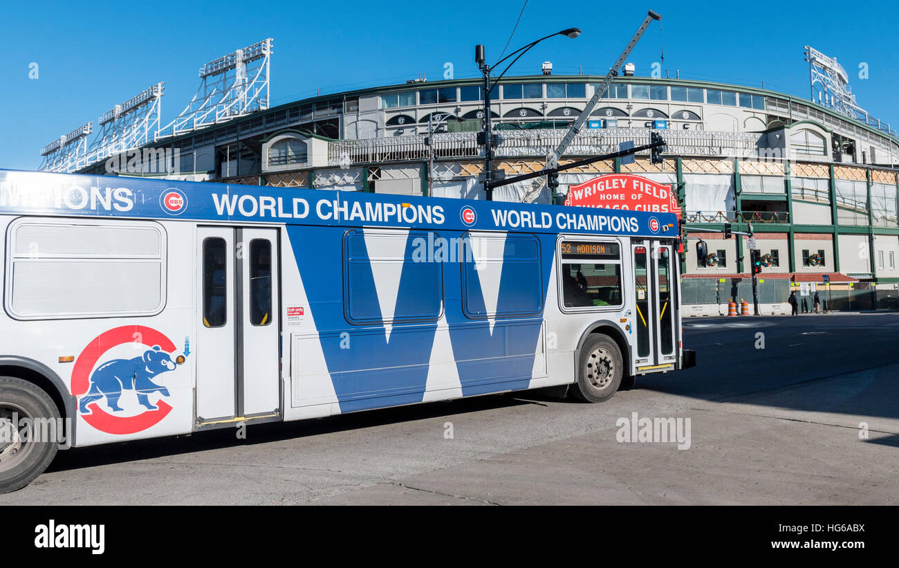 Chicago, USA. 4th Jan, 2017. A CTA bus, celebrating the Chicago Cubs, passes Wrigley Field, the home of baseball's Chicago Cubs, and current World Series Champions, which is undergoing refurbishment and reconstruction. Works include construction of The Hotel Zachary as well as a new retail/entertainment complex at Addison & Clark. © Stephen Chung/Alamy Live News Stock Photo