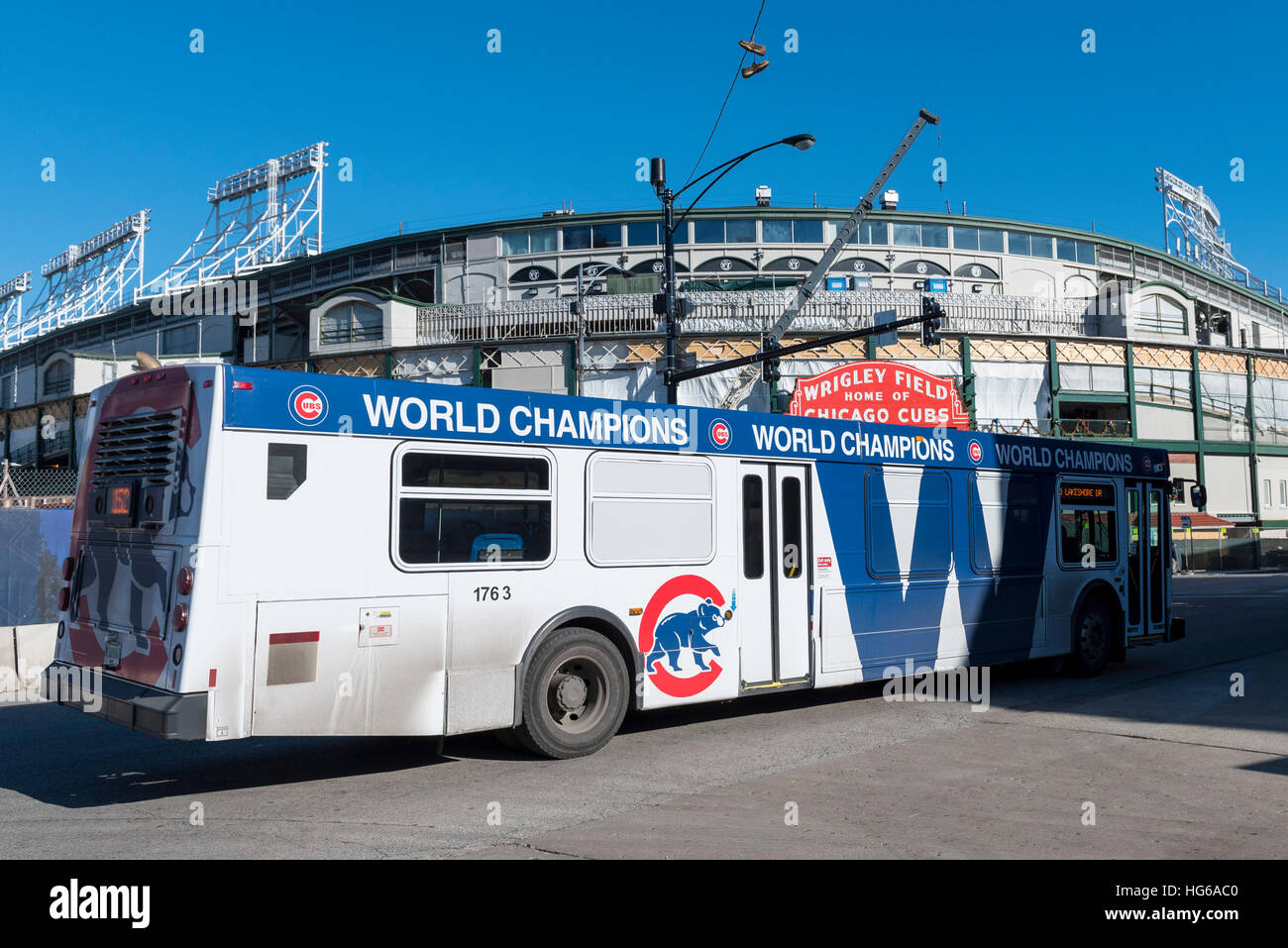 Chicago, USA. 4th Jan, 2017. A CTA bus, celebrating the Chicago Cubs, passes Wrigley Field, the home of baseball's Chicago Cubs, and current World Series Champions, which is undergoing refurbishment and reconstruction. Works include construction of The Hotel Zachary as well as a new retail/entertainment complex at Addison & Clark. © Stephen Chung/Alamy Live News Stock Photo