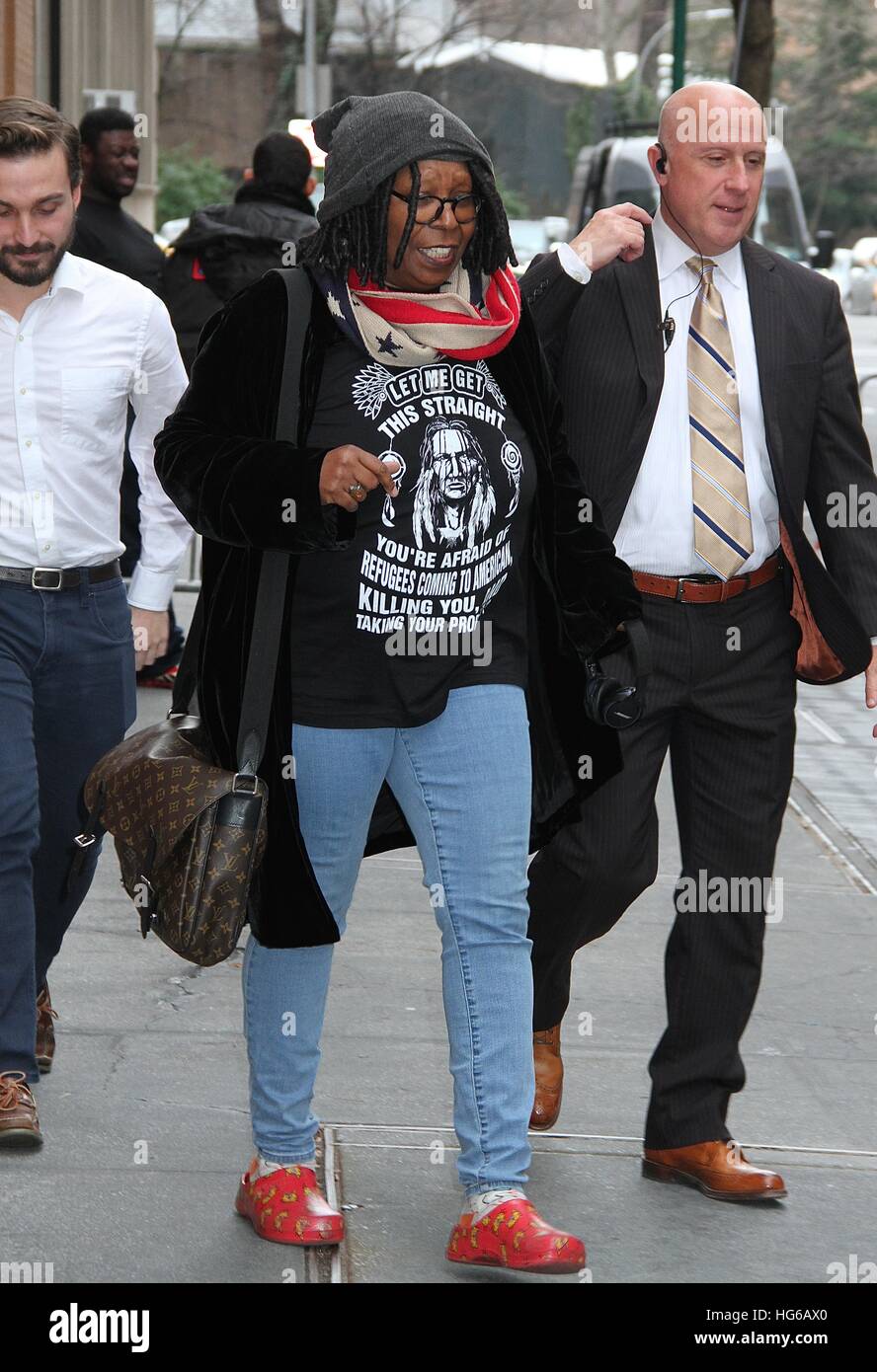 New York, NY, USA. 4th Jan, 2017. Whoopi Goldberg spotted leaving 'The View' wearing a graphic t-shirt of a Native America with the quote: 'Let me get this straight, you're afraid of refugees coming to America killing you and taking your property?' as well as an American Flag-inspired scarf in New York on January 4, 2017. © Rainmaker Photo/Media Punch/Alamy Live News Stock Photo