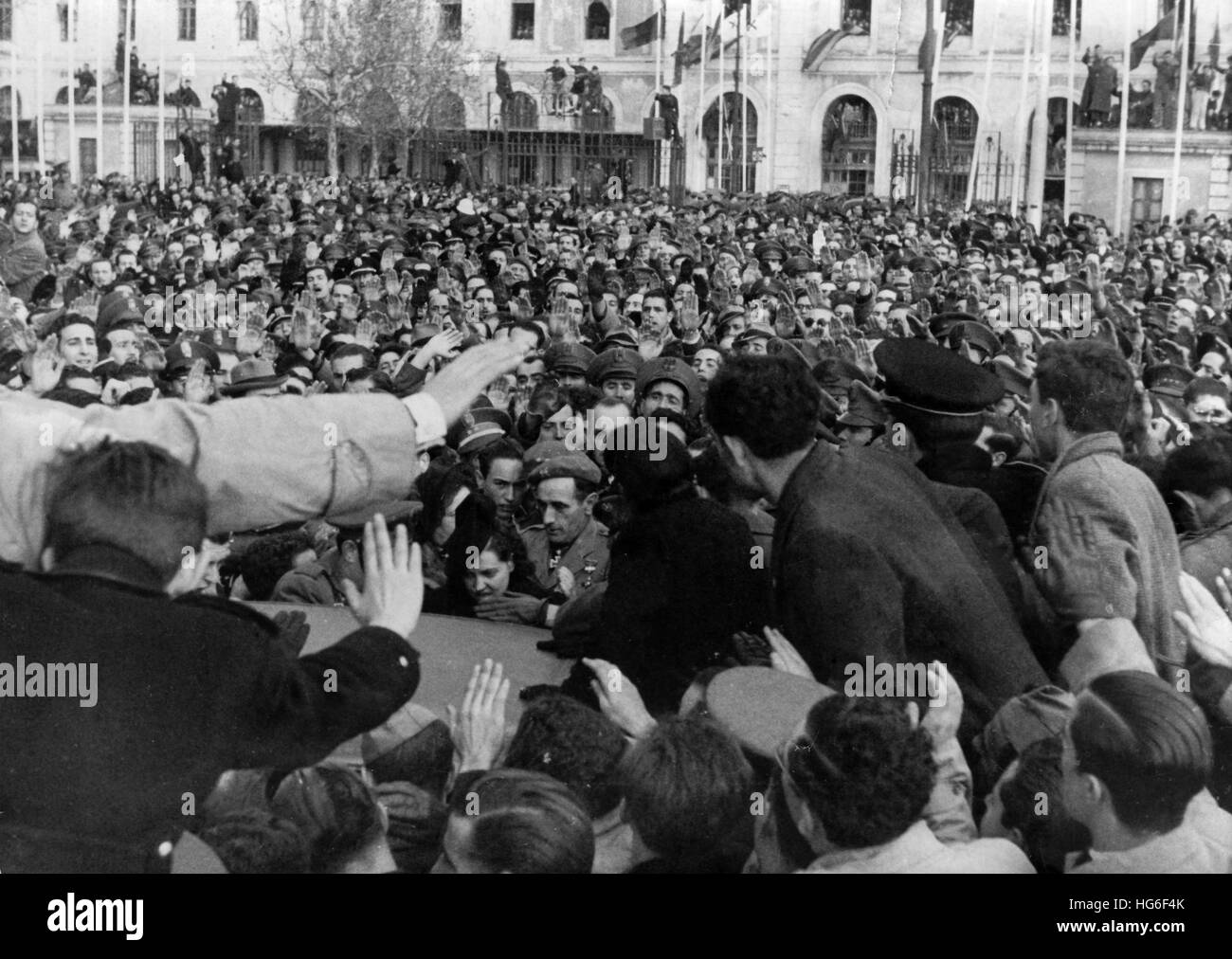 The Nazi propaganda picture shows the ceremonial reception of Augustín Munoz Grandes (at the car), the Commander of the Spanish Volunteer Division (Blue Division) of the German Wehrmacht, by the Spanish population at the Madrid train station. The photo was taken in Madrid, Spain, December 1942. Fotoarchiv für Zeitgeschichtee - NO WIRE SERVICE - | usage worldwide Stock Photo