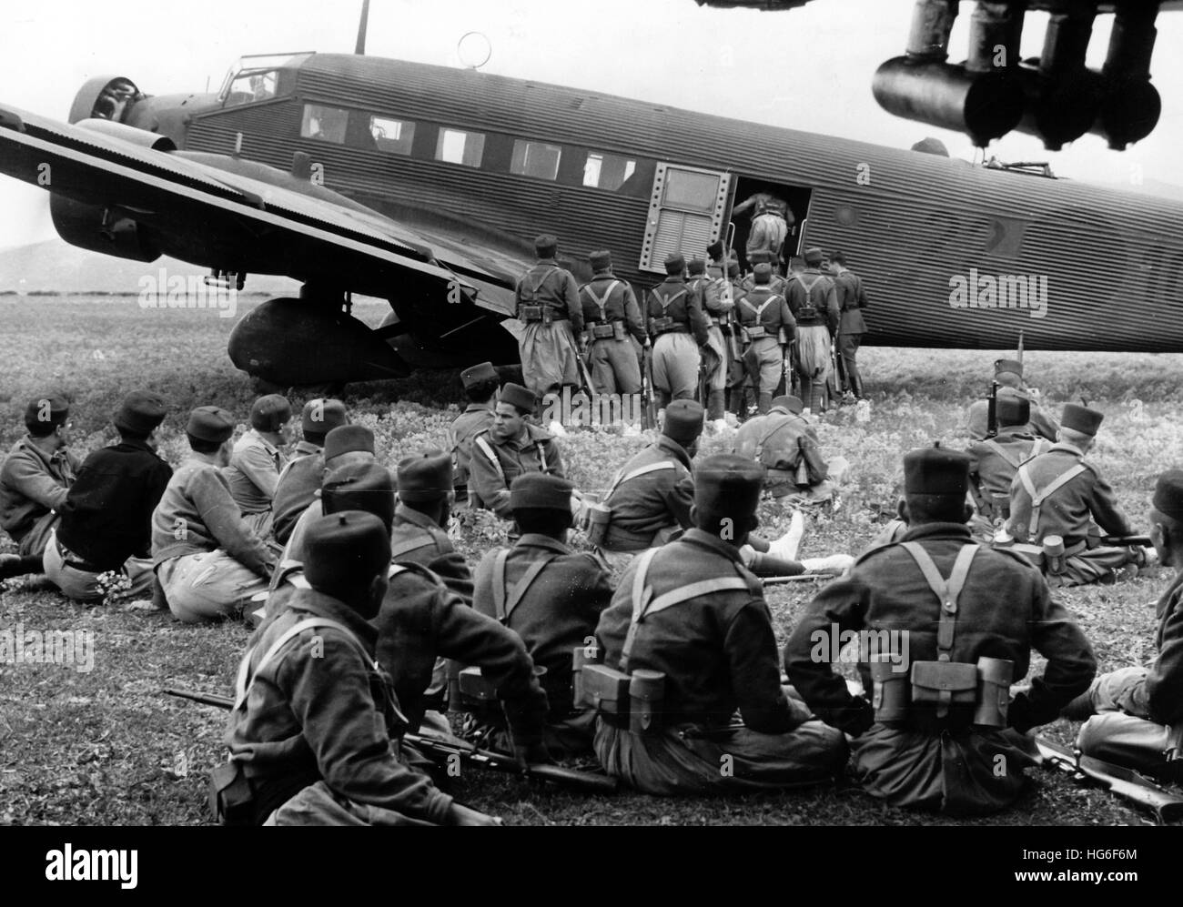 The Nazi propganda picture shows how the German production company UFA shoots a film about the Spanish Civil War in Tetuán, Mexico, Apri 1939, after Francos seizure of power. The photo depicts the opening scene of the movie, where Spanish-Moroccan colonial troops enter a German cargo aircraft, type Junkers Ju 52 in . Fotoarchiv für Zeitgeschichtee - NO WIRE SERVICE - | usage worldwide Stock Photo