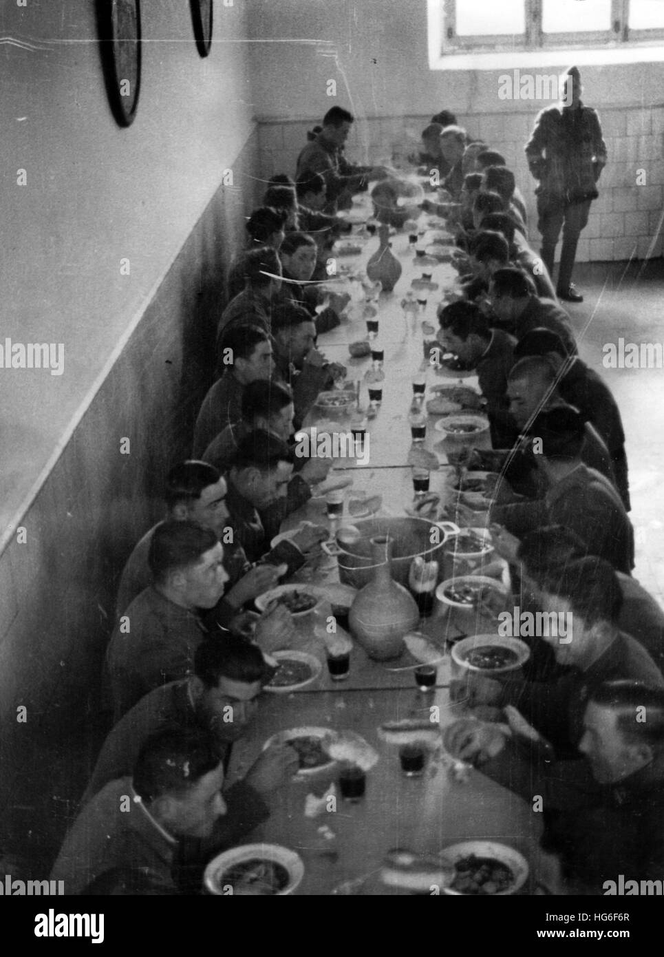 The Nazi propaganda picture shows new recruits of Francos troops during lunch in cavalry barracks in Salamanca, Spain, February 1937. Fotoarchiv für Zeitgeschichtee - NO WIRE SERVICE - | usage worldwide Stock Photo