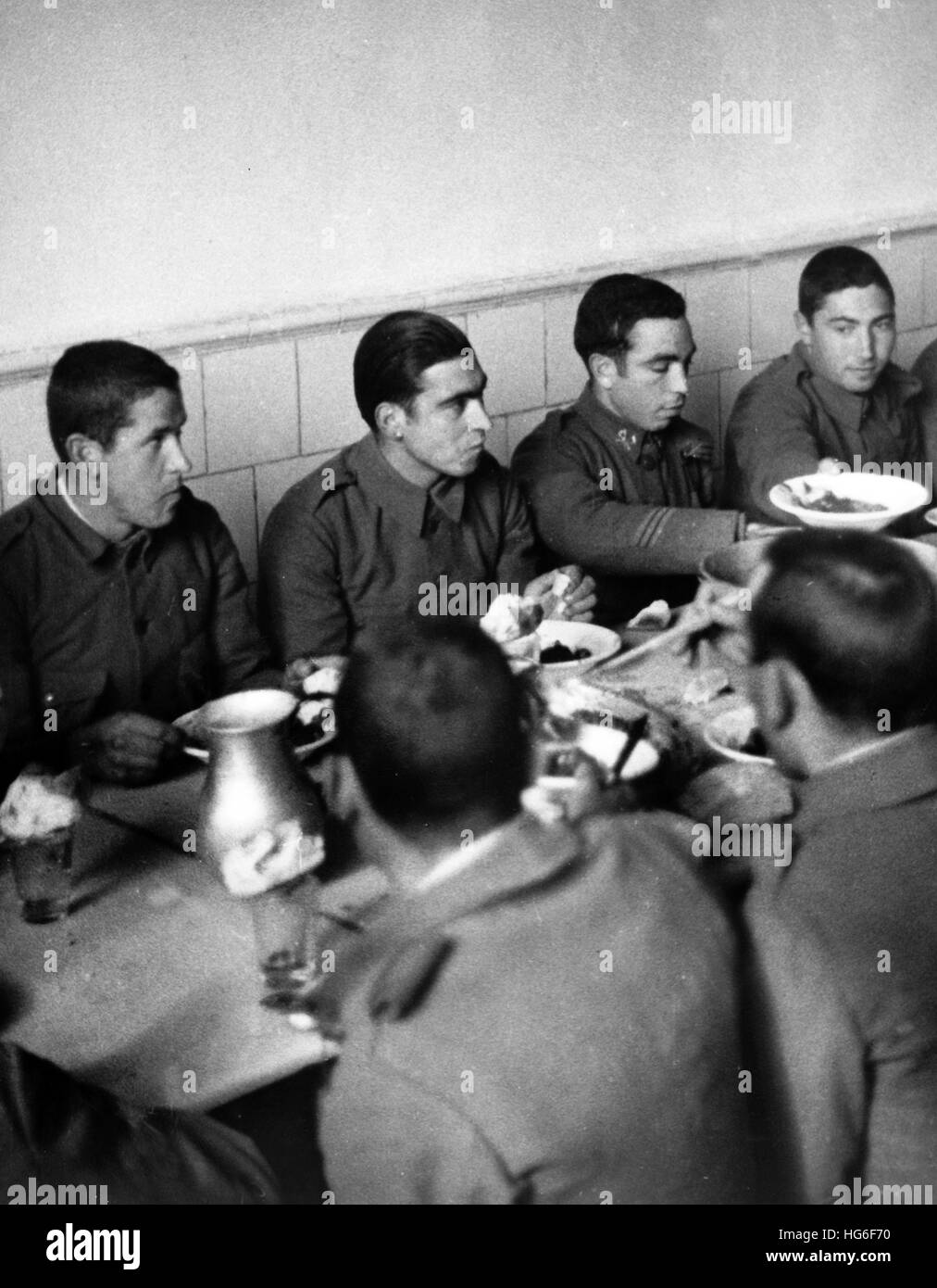 The Nazi propaganda picture shows new recruits of Francos troops during lunch in the cavalry barracks in Salamanca, Spain, February 1937. Fotoarchiv für Zeitgeschichtee - NO WIRE SERVICE - | usage worldwide Stock Photo