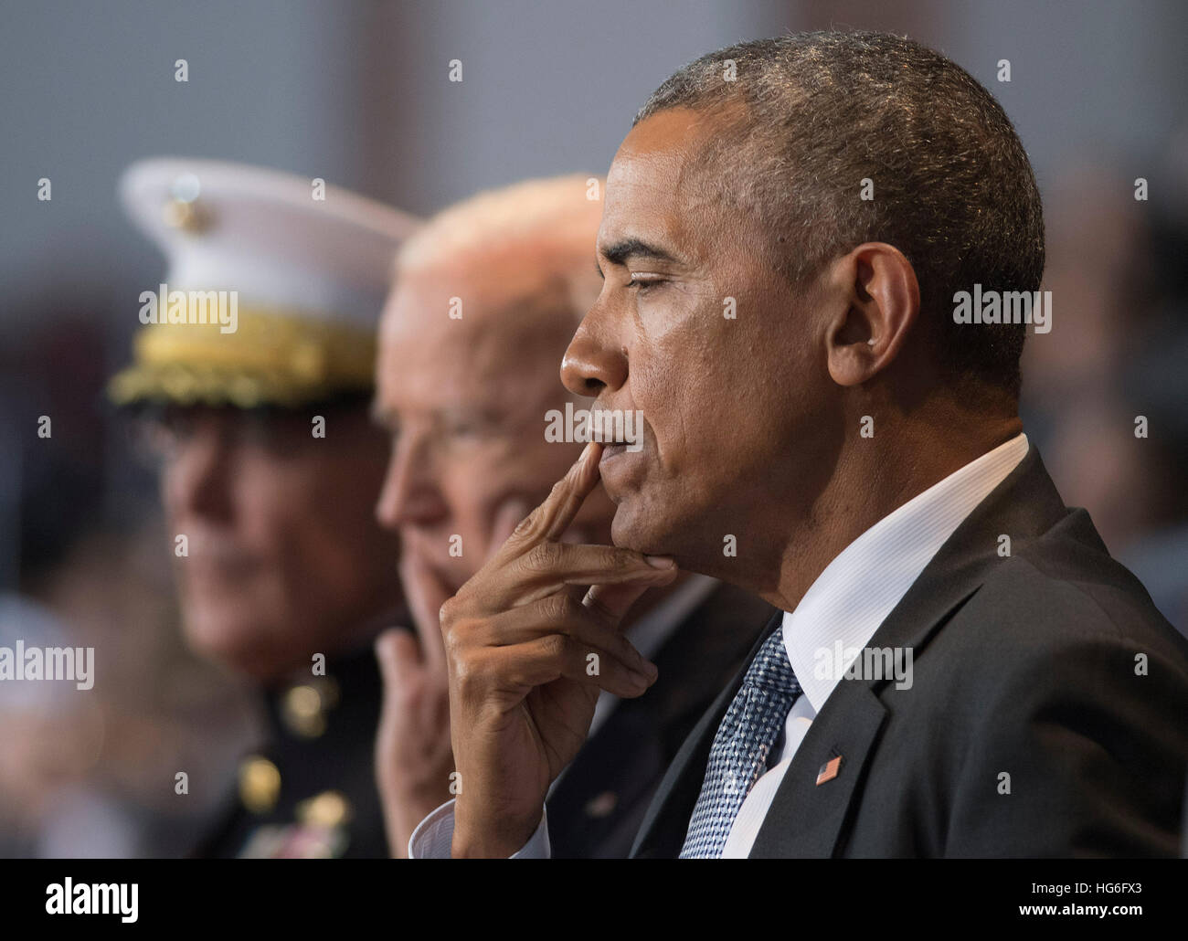 Joint Base Myers-Henderson Hall, Virginia, USA. 4th January, 2017.  United States President Barack Obama (R), Vice President Joe Biden (C) and Chairman of the Joint Chiefs of Staff Gen. Joseph Dunford Jr. attends the Armed Forces Full Honor Review Farewell Ceremony for President Obama at Joint Base Myers-Henderson Hall, in Virginia on January 4, 2017. The five braces of the military honored the president and vice-president for their service as they conclude their final term in office. Credit: MediaPunch Inc/Alamy Live News Stock Photo