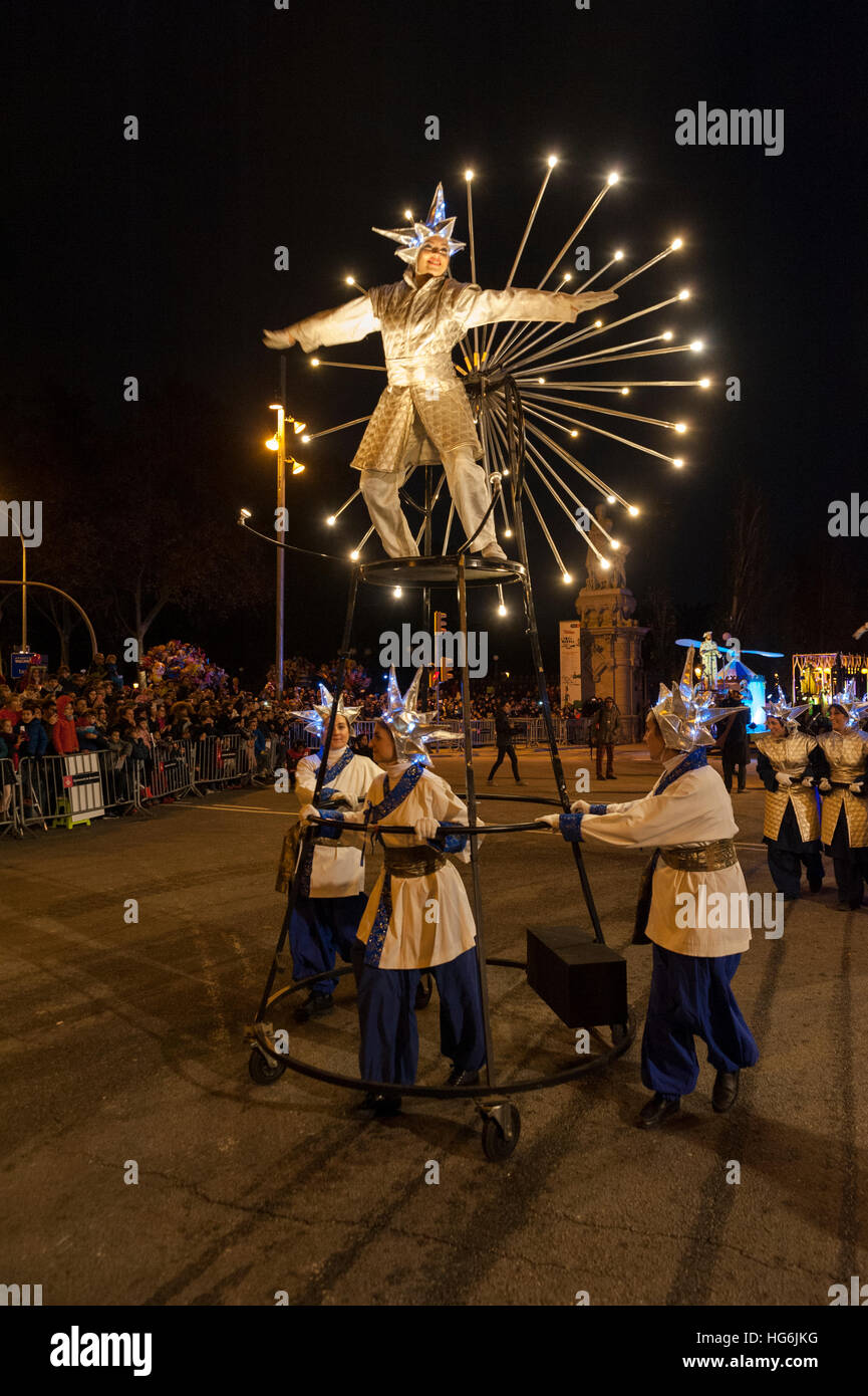 Artists perform on a street as they march during 'Cabalgata de Reyes,' or the Three Wise Men parade in Barcelona, Spain, thursday, 05th Jan, 2017. It is a parade symbolizing the coming of the Magi to Bethlehem following the birth of Jesus. In Spain and many Latin American Countries Epiphany is the day When gifts are Exchanged. © Charlie Perez/Alamy Stock Photo