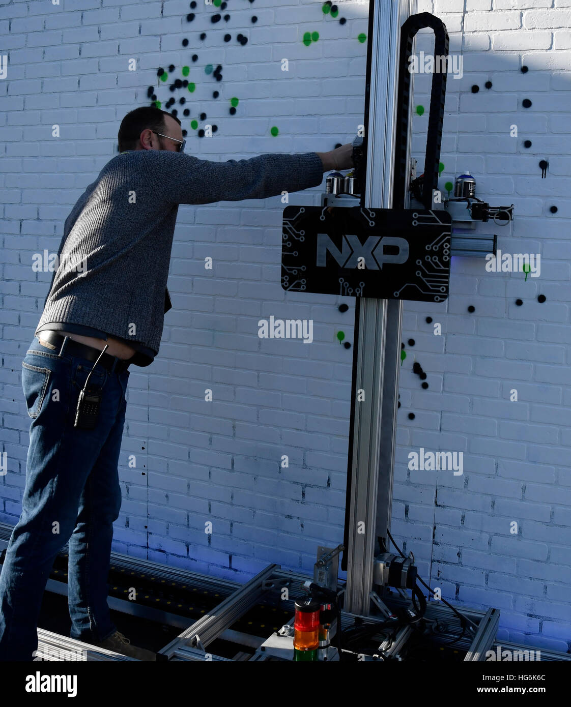 Las Vegas Nevada, USA. 5th Jan, 2017. NXP shows their robotic wall painter on display during Day