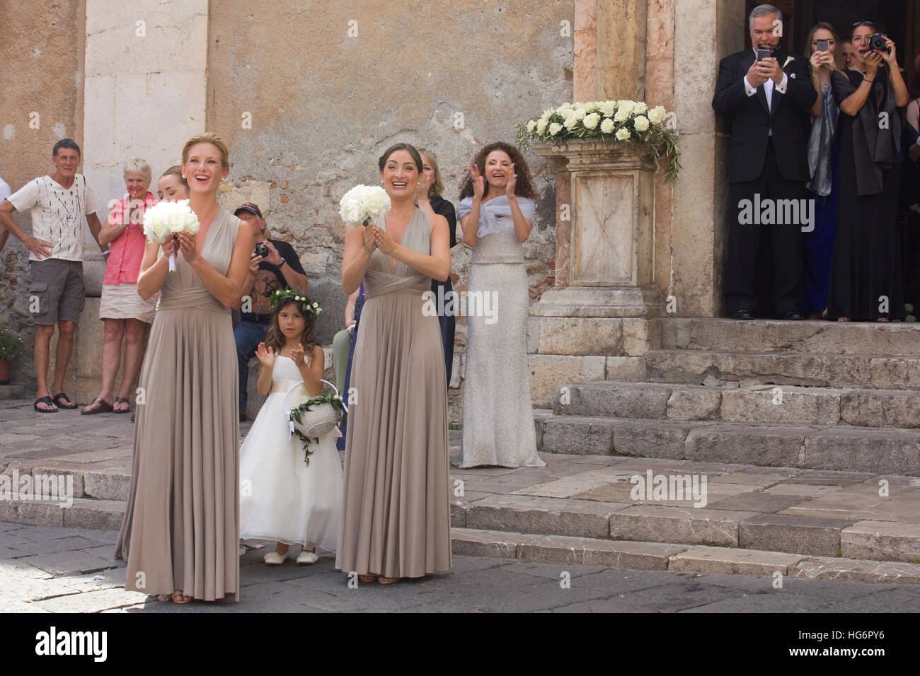 Bridesmaids waiting for the bride at an Italian Sicilian wedding. Stock Photo