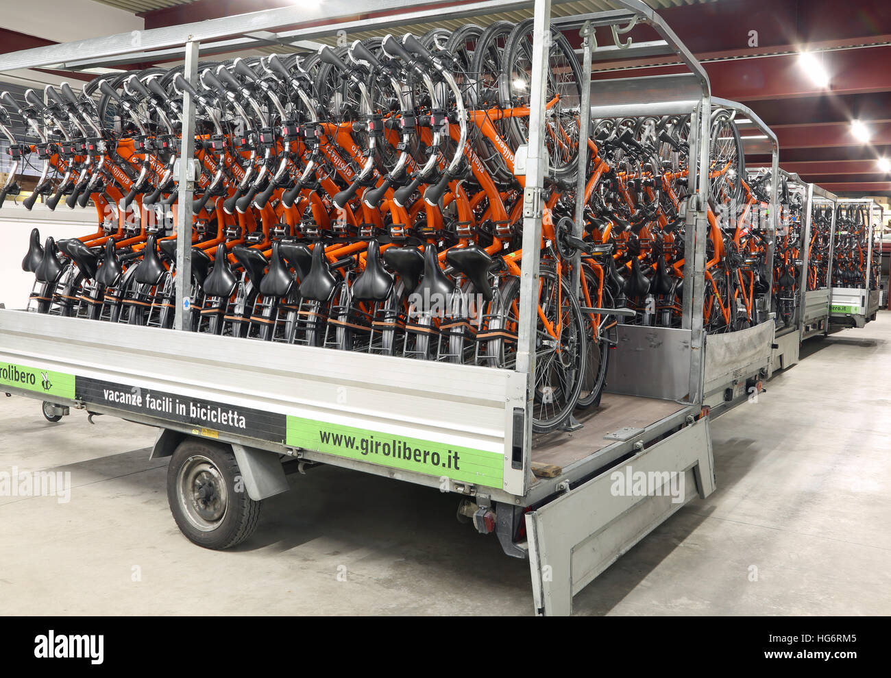 Vicenza, VI, Italy - January 1st, 2017: tow trucks full of bicycles  of the company Girolibero the principal european tour operator specialising in cy Stock Photo