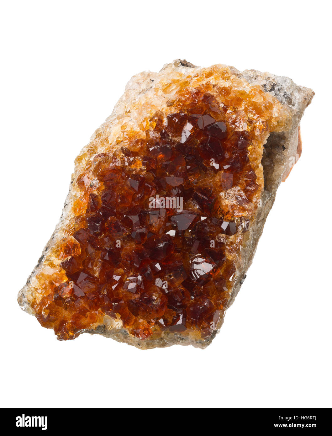 Burnt amethyst (citrine) crystal on matrix isolated on white background Stock Photo