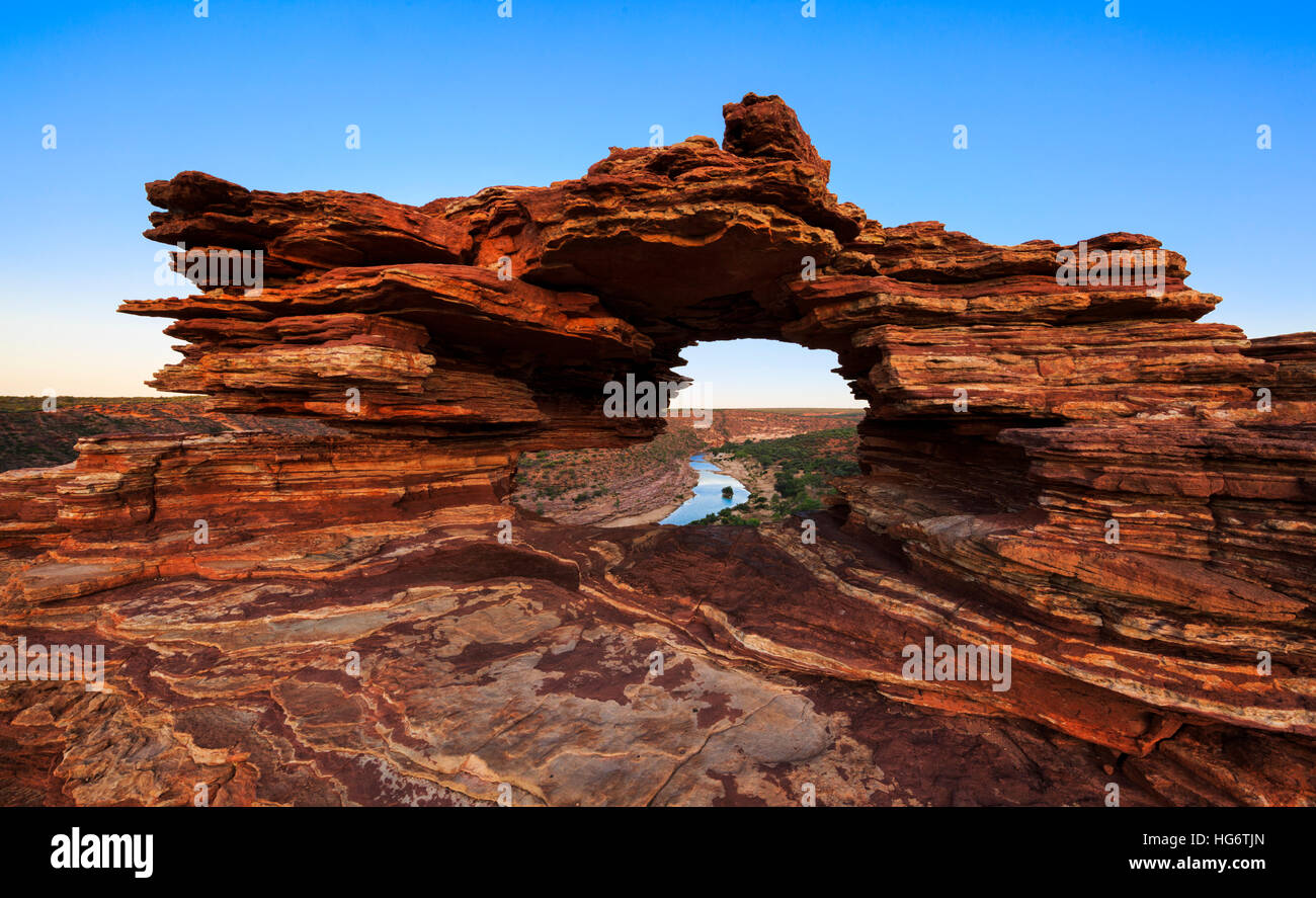 Nature's Window lookout (formed from layers of Tumblagooda Sandstone) and the Murchison River in Kalbarri National Park, WA Stock Photo