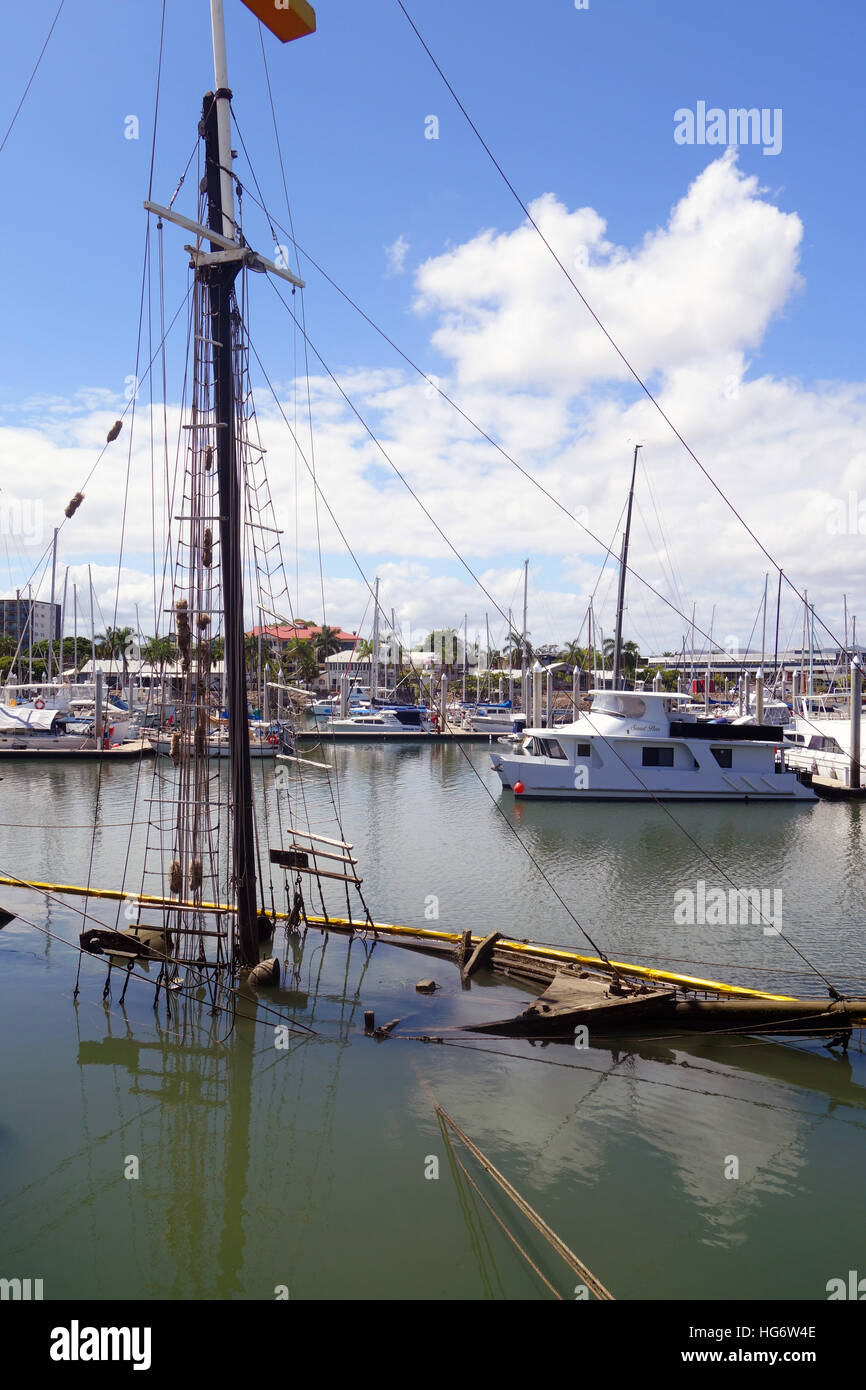 Sunken historic pearl lugger ship in marina, Townsville port, Queensland, Australia. No PR Stock Photo