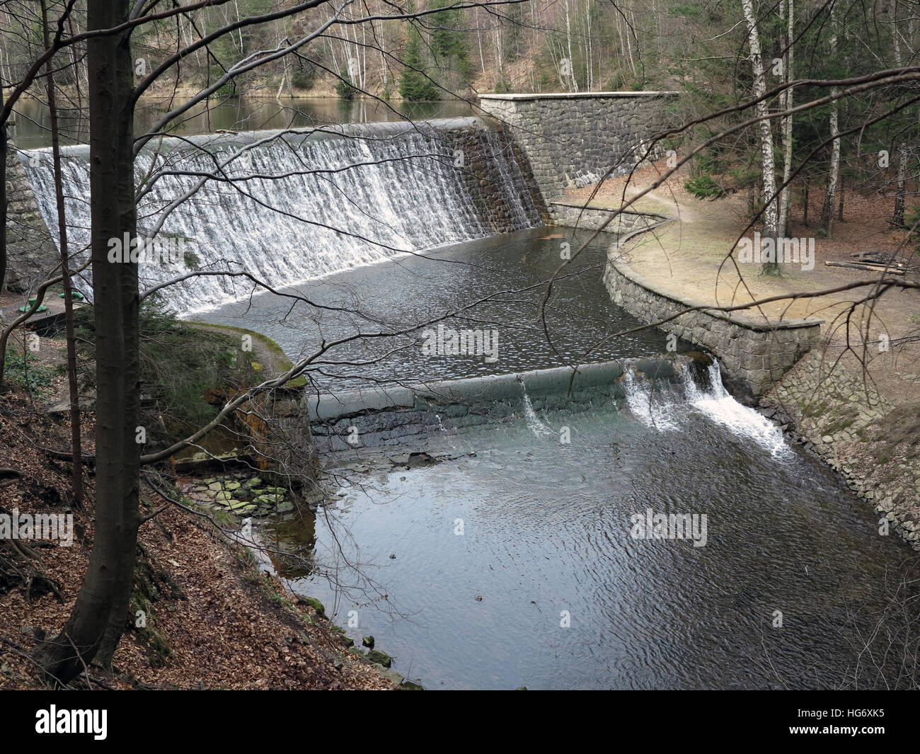 Cascade of water to spillway of the dam Stock Photo