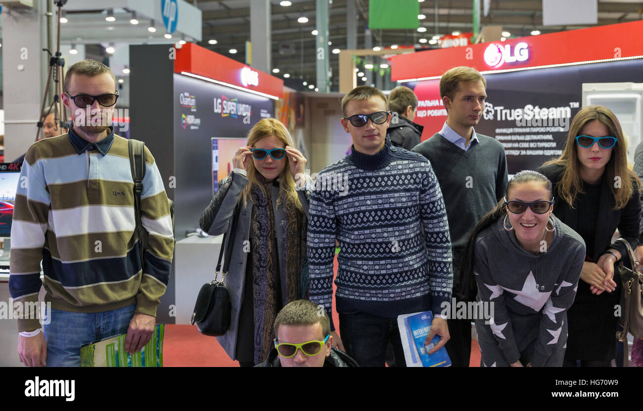 People testing 3D TV glasses at LG, Korean multinational conglomerate corporation booth during CEE 2016. Stock Photo