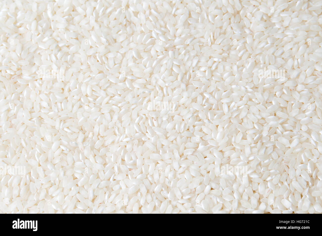White rice grains background pattern texture Stock Photo