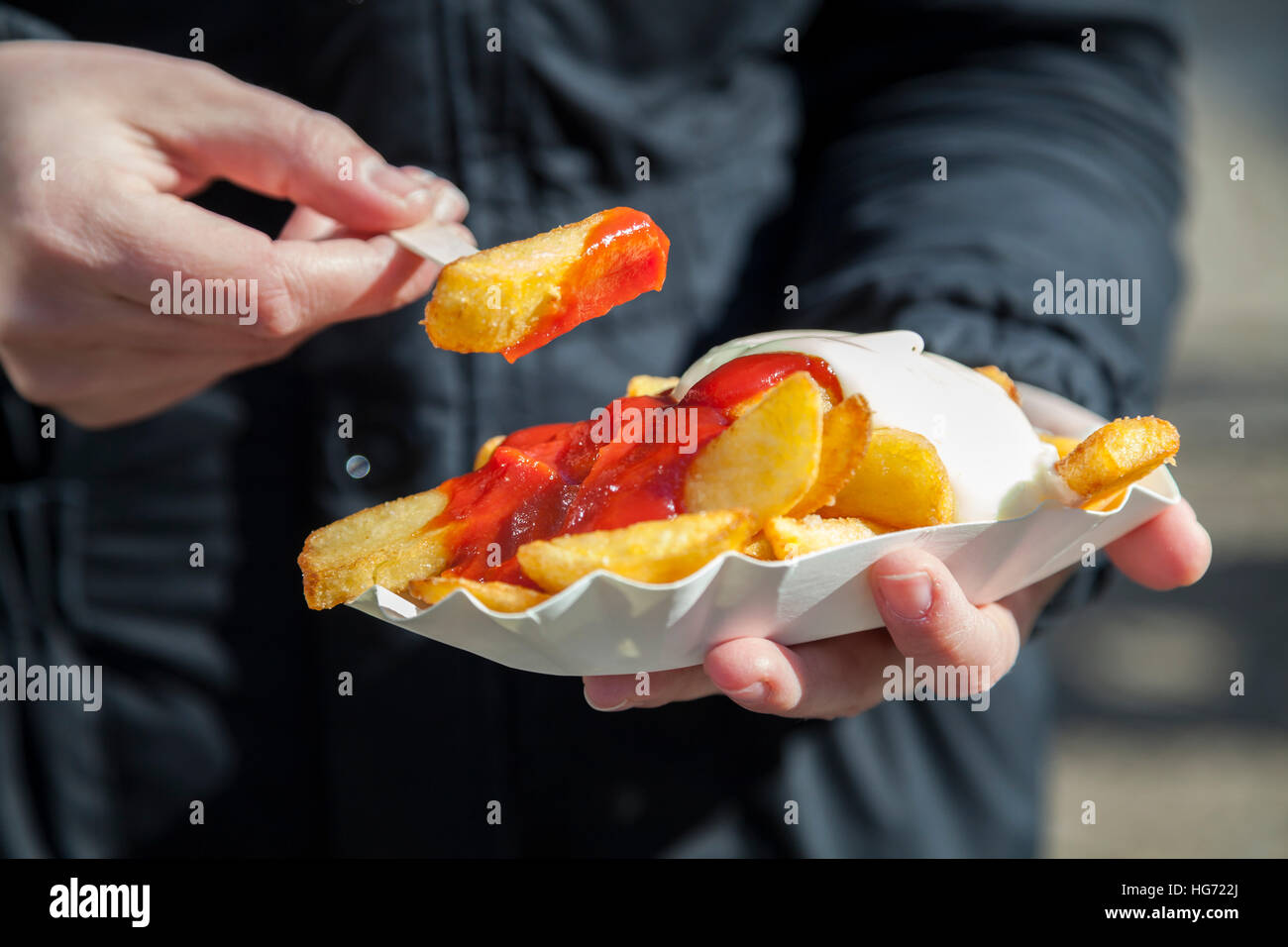 Eating french fries Stock Photo Alamy