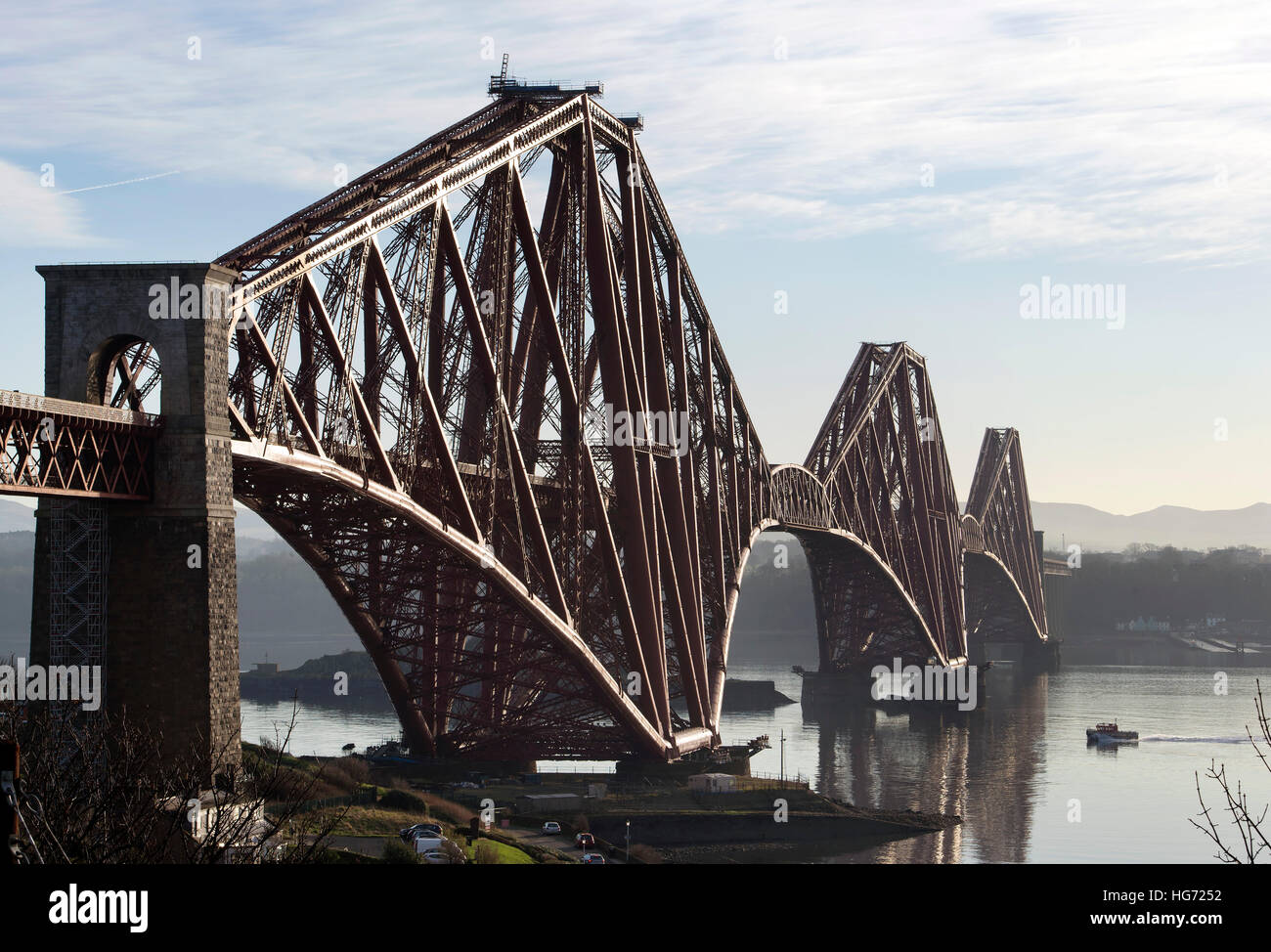 The Forth Rail Bridge viewed from the village of North Queensferry looking south over the Firth of Forth. Stock Photo