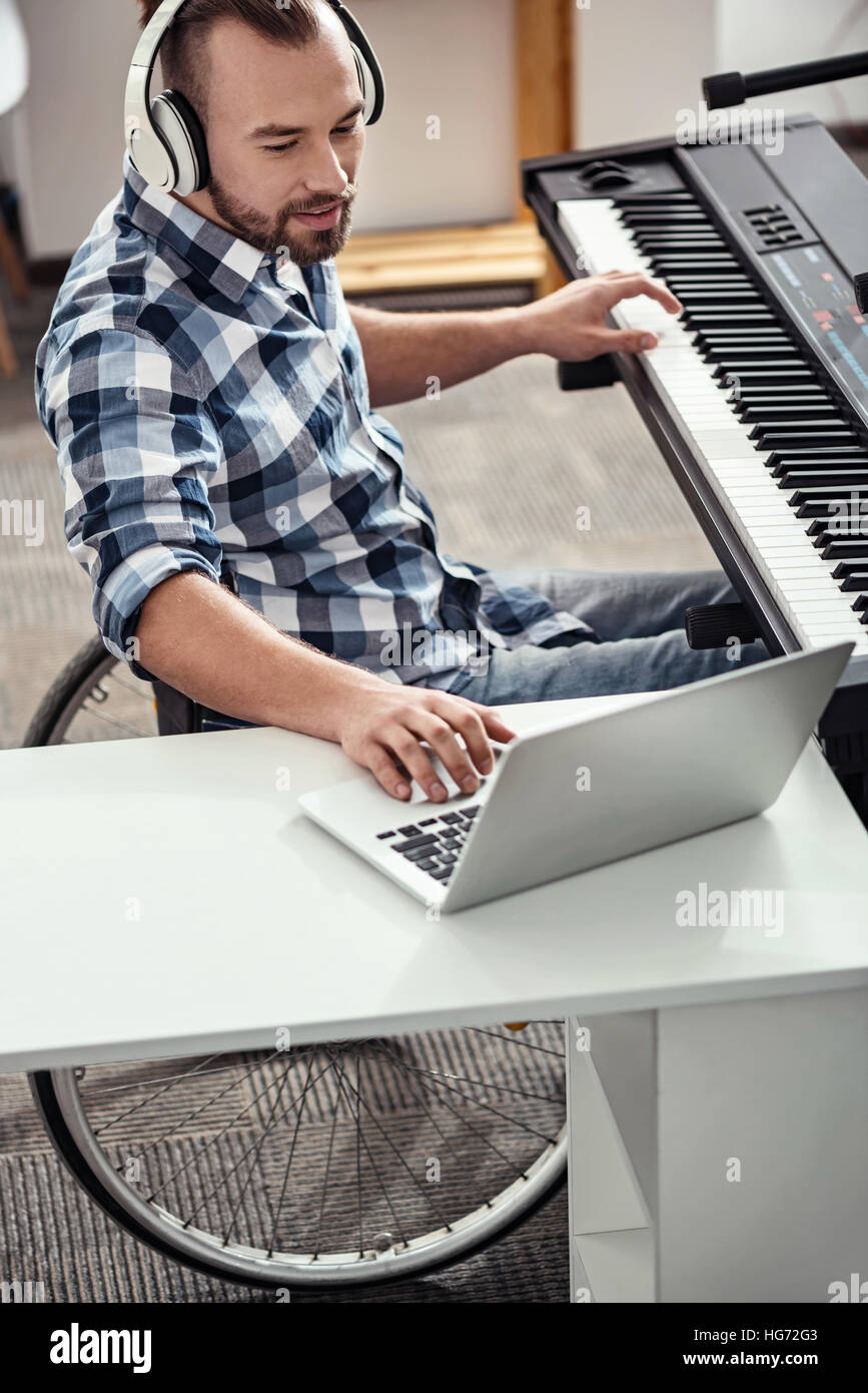 Professional musician adding sound effects Stock Photo Alamy