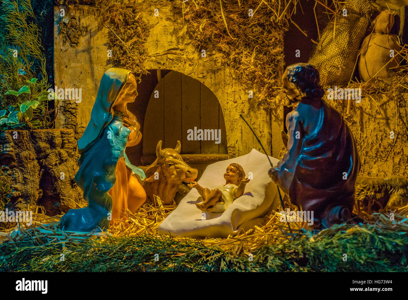 Christmas Nativity scene of baby Jesus in the manger with Saint Joseph ...