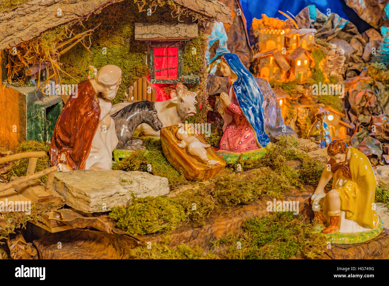 Christmas Nativity scene of baby Jesus in the manger with Saint Joseph ...