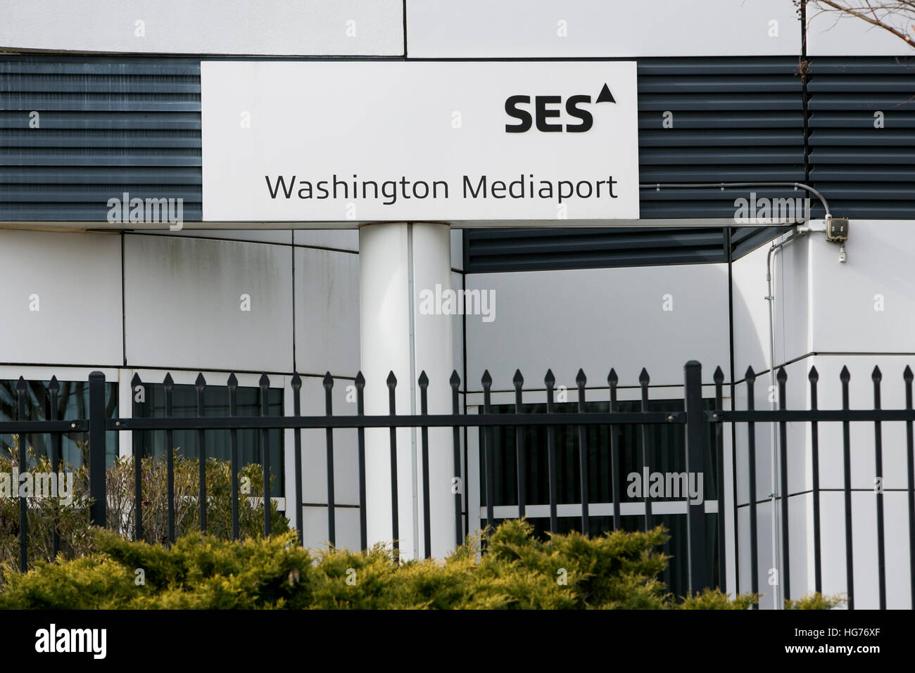 A logo sign outside of the SES Washington Mediaport in Gainesville, Virginia on December 31, 2016. Stock Photo