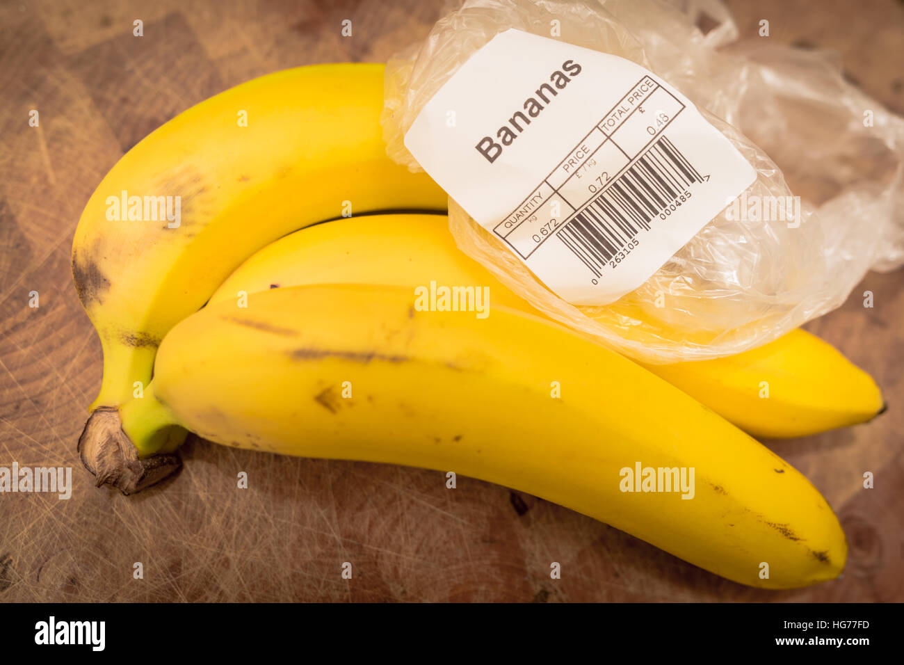 Three bananas from Tesco supermarket, showing the label price and barcode Stock Photo Alamy