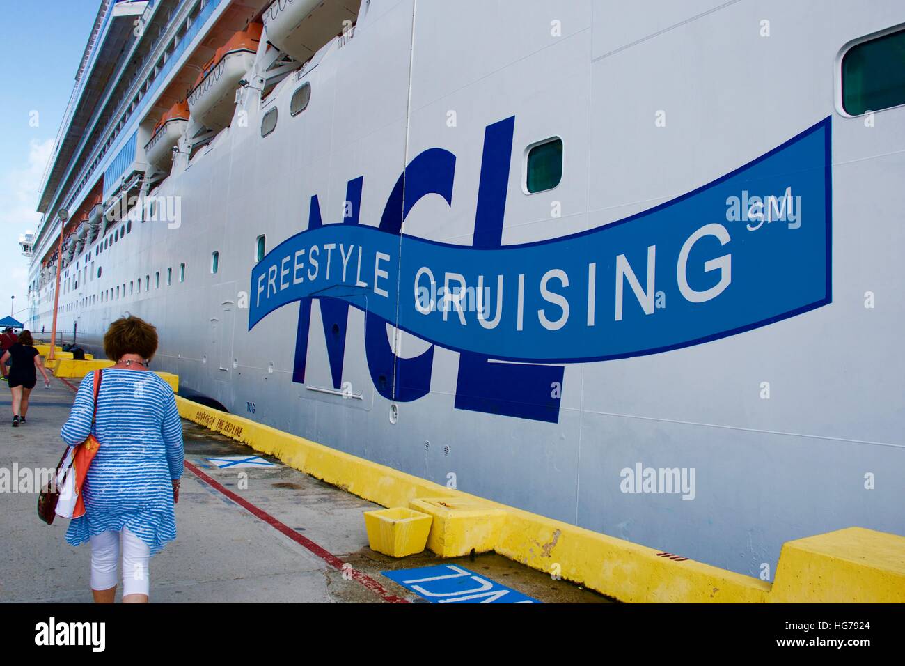 Norwegian Cruise Lines (NCL) Freestyle Cruising side of boat at dock Stock Photo