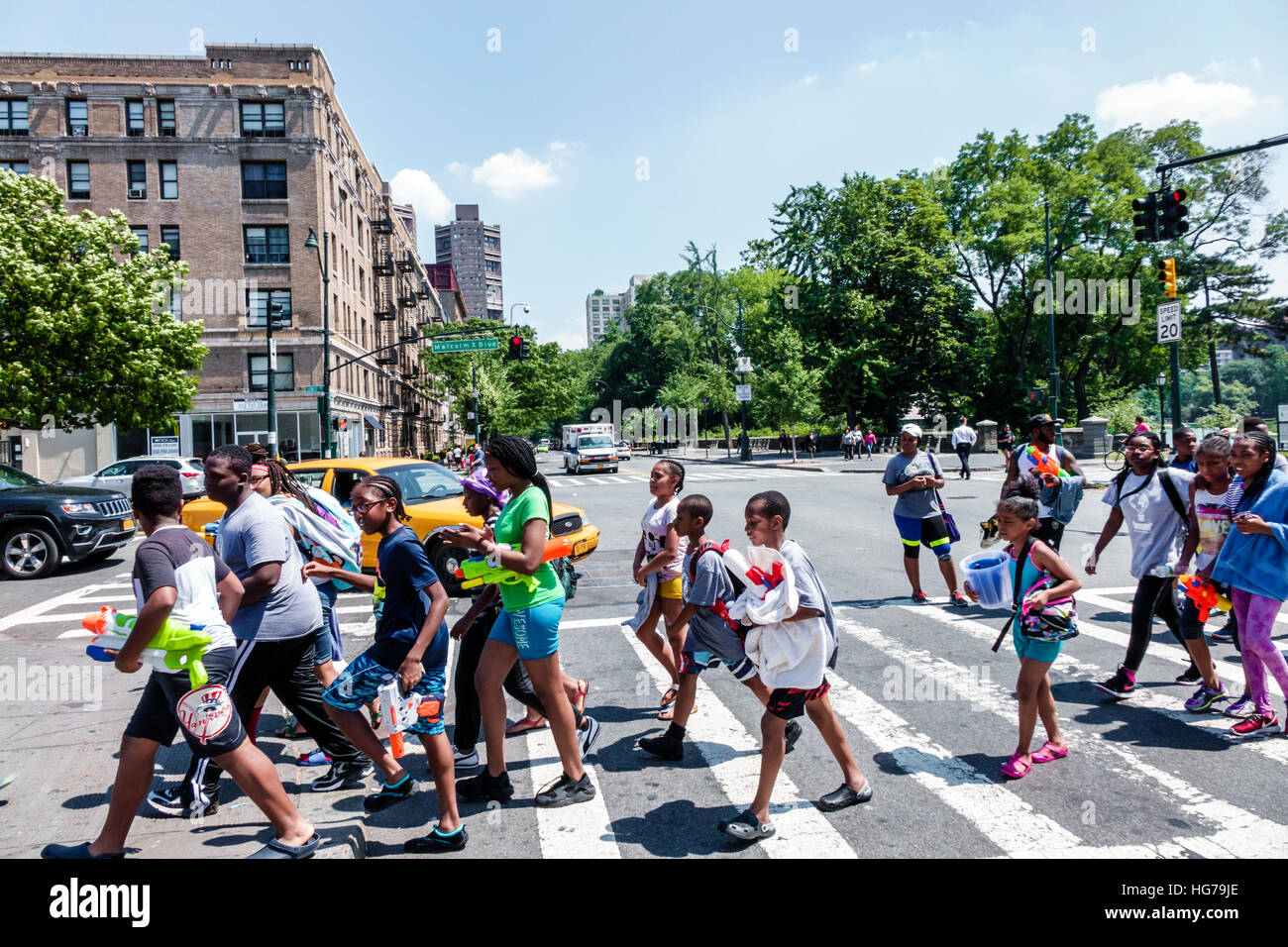 New York City,NY NYC,Manhattan,Spanish Harlem,street crossing,traffic,intersection,Black Blacks