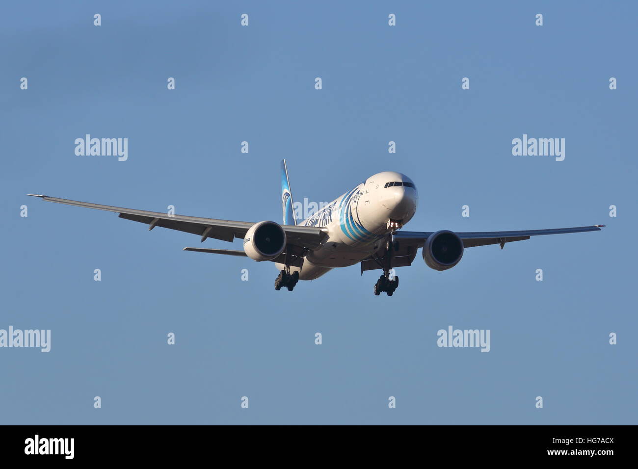 Egyptair Boeing 777-300ER SU-GDO landing at London Heathrow Airport, UK Stock Photo