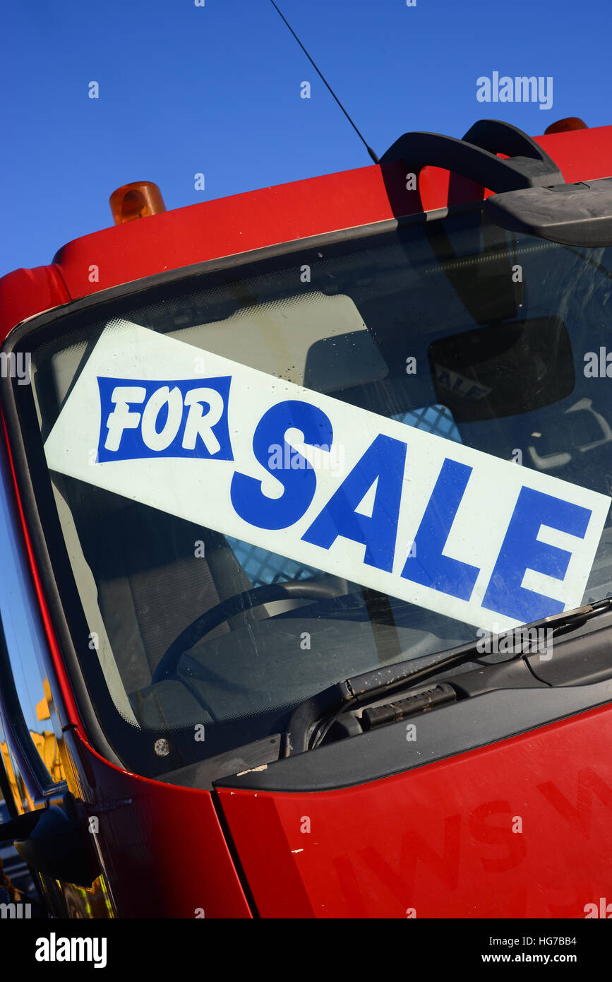 for sale sign in window of secondhand lorry at dealership uk Stock Photo