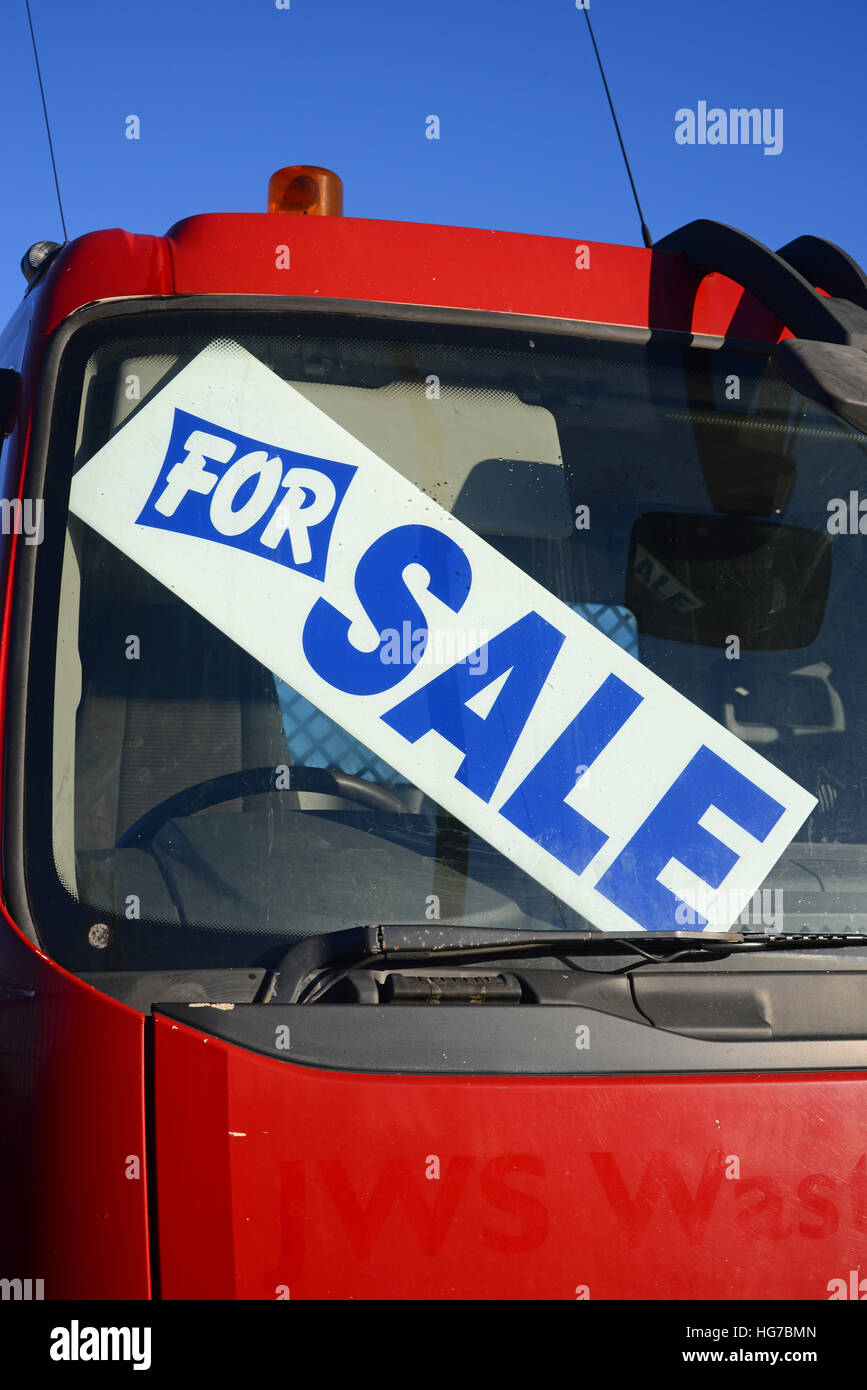 for sale sign in window of secondhand lorry at dealership uk Stock Photo