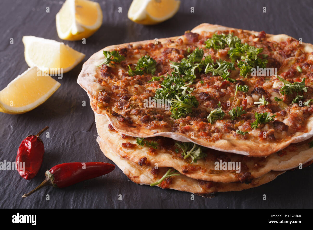 Lahmacun - Turkish pizza closeup on a stone table. horizontal Stock Photo