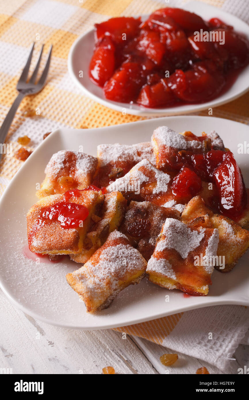 scrambled egg souffle with plum sauce close-up on a plate. Vertical Stock Photo