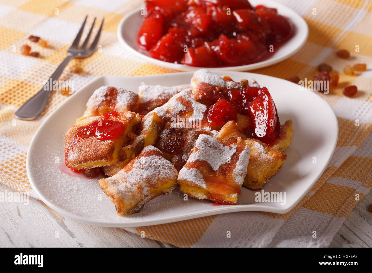 scrambled egg souffle with plum sauce close-up on a plate. horizontal Stock Photo