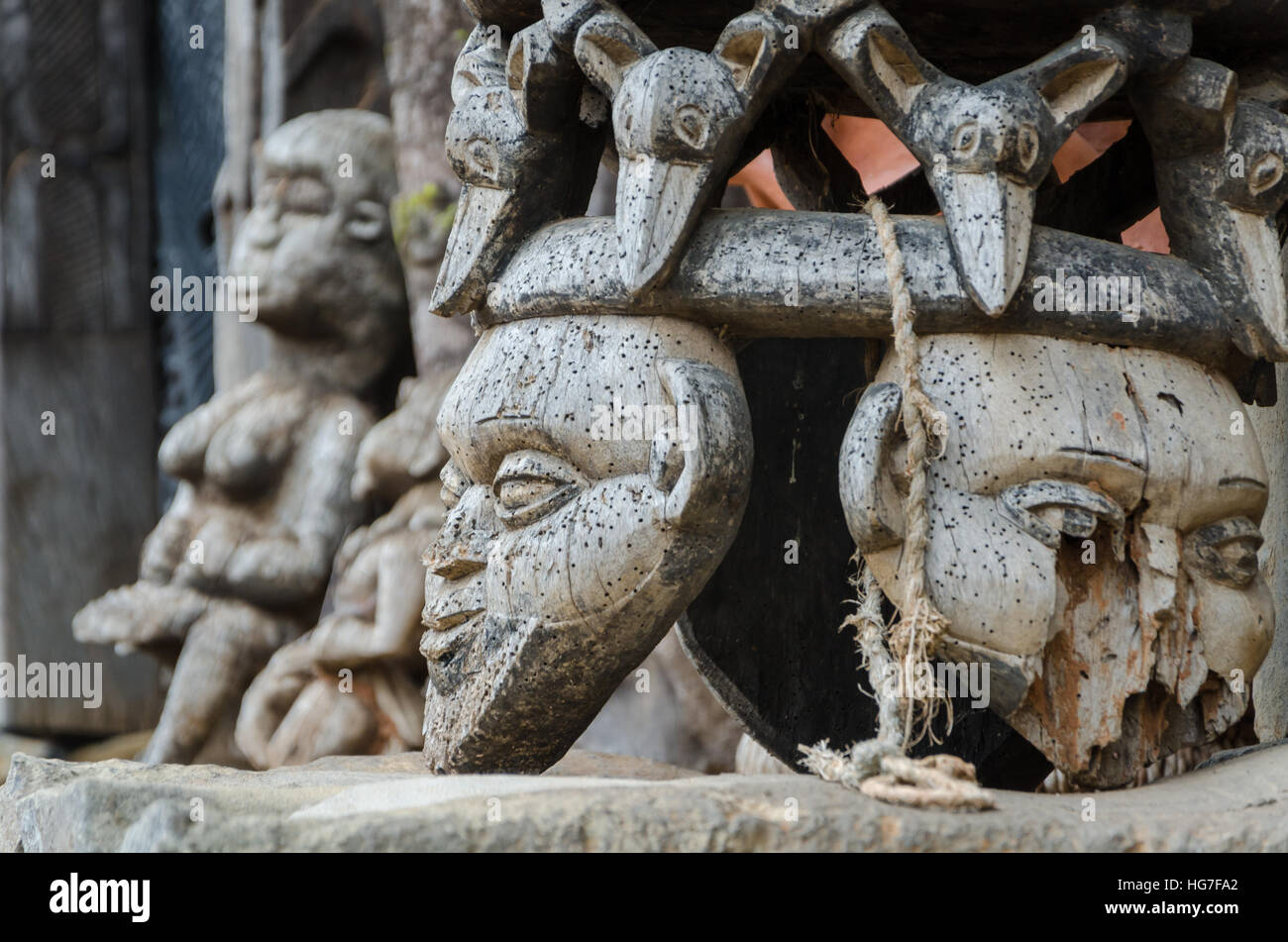 Chair and other African wood carvings at traditional Fon's palace in