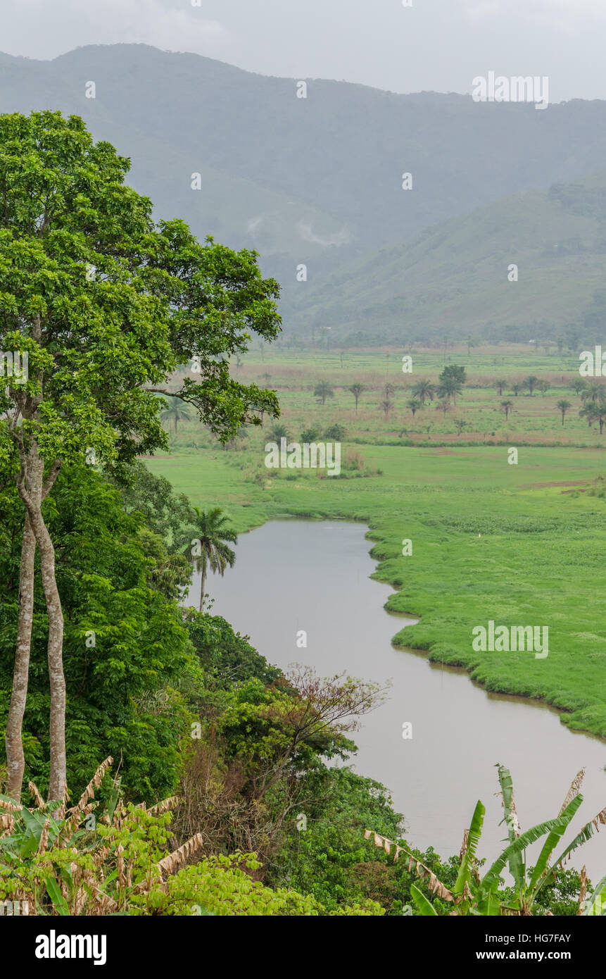 River with mountains and lush vegetation at Ring Road in Cameroon, Africa Stock Photo