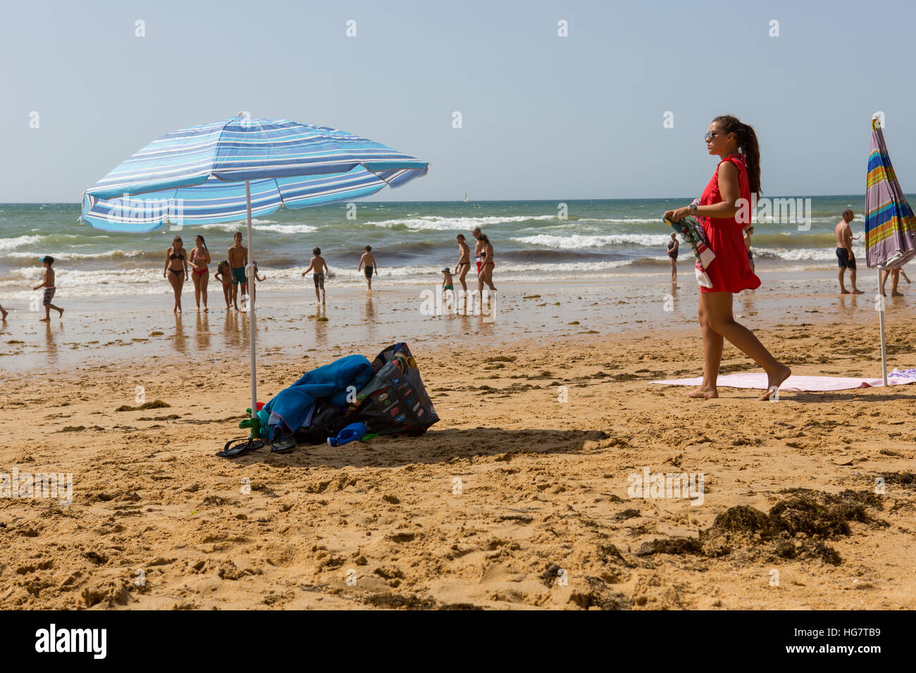 People at the famous beach of Olhos de Agua in Albufeira. Stock Photo
