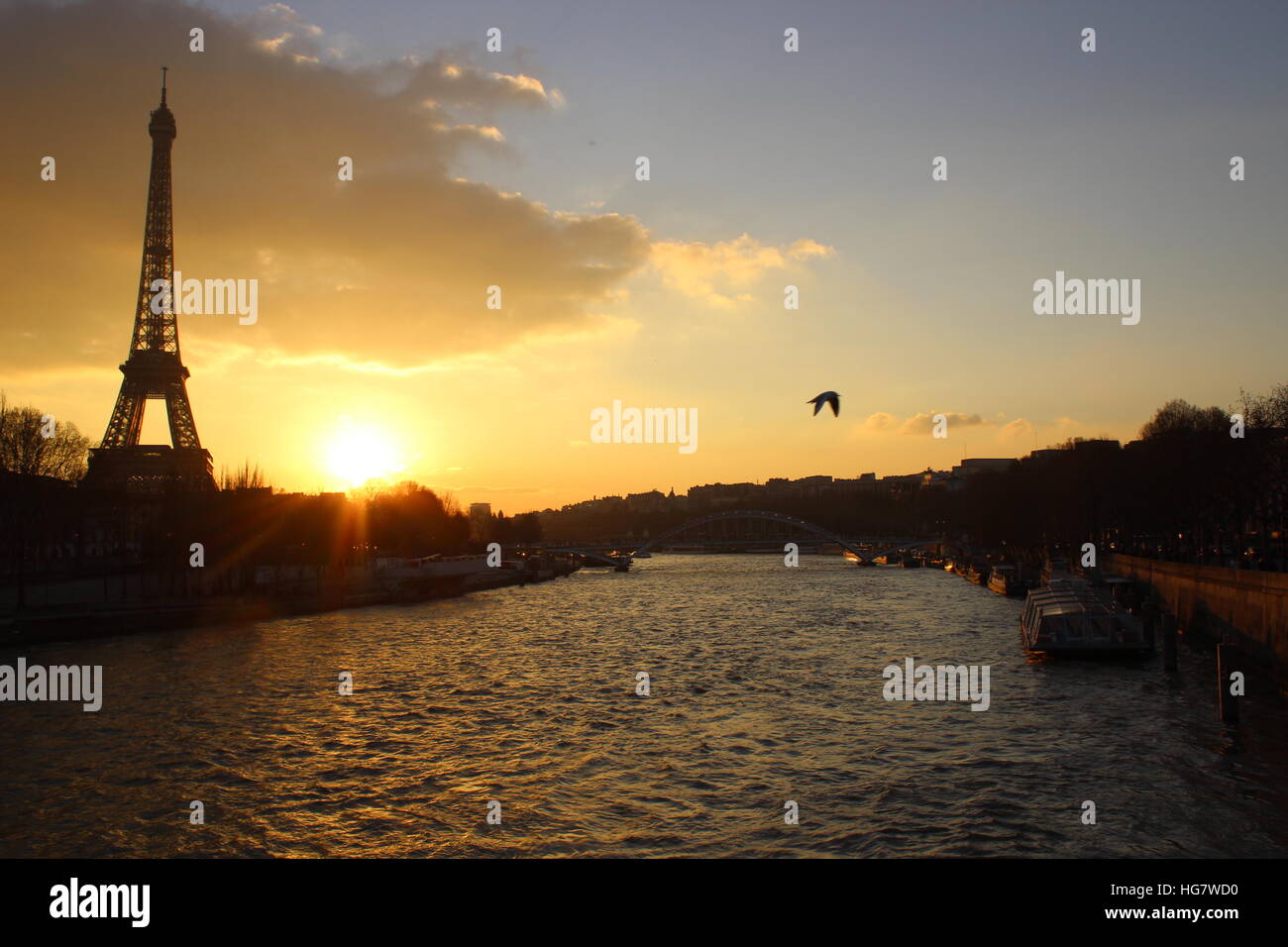 Sunset in Paris by the river Stock Photo - Alamy