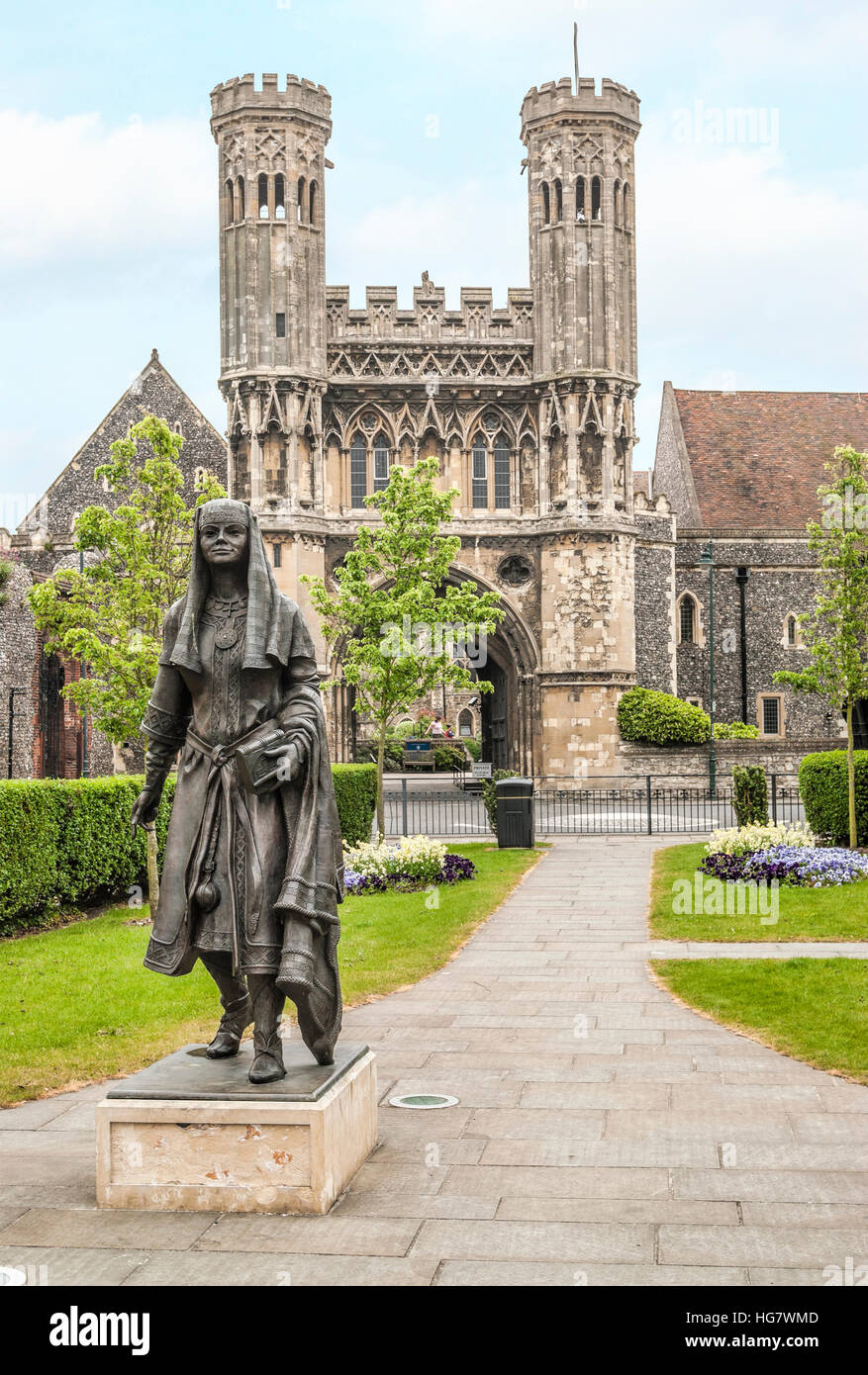 Statue of Bertha, Queen of Kent, princess of the Franks, in front of the entrance gate to Kings School in Canterbury Stock Photo