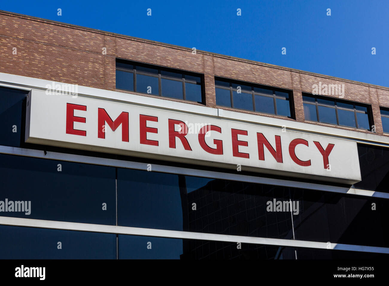 White and Red Emergency Entrance Sign for a Local Hospital XII Stock Photo