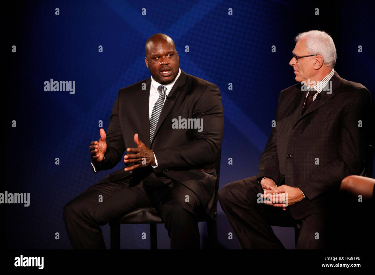 Shaquille O'Neal and Phil Jackson sit down with Hannah Storm and discuss their playing days as part of the American Express Teamed Up series. Stock Photo