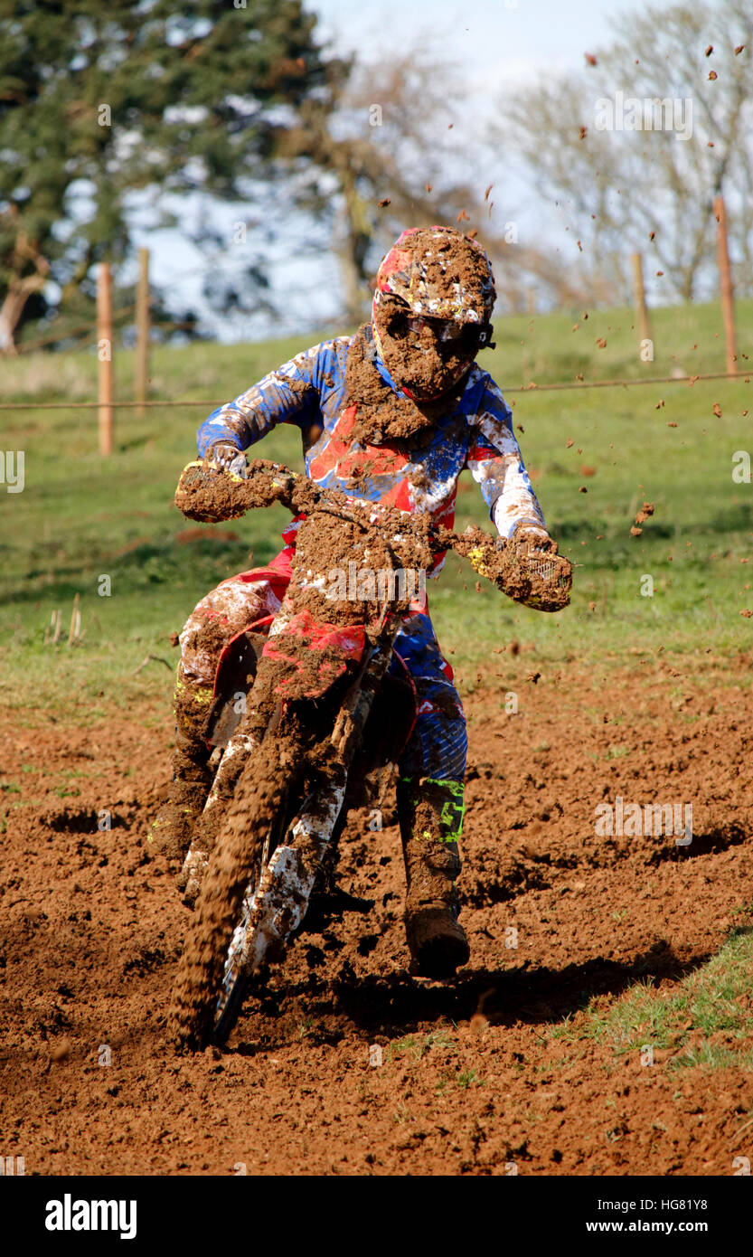 A motocross rider in a race at Badby in Northamptonshire Stock Photo