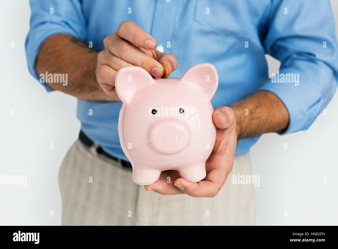 Man Holding Piggy Bank Saving Portrait Concept Stock Photo - Alamy