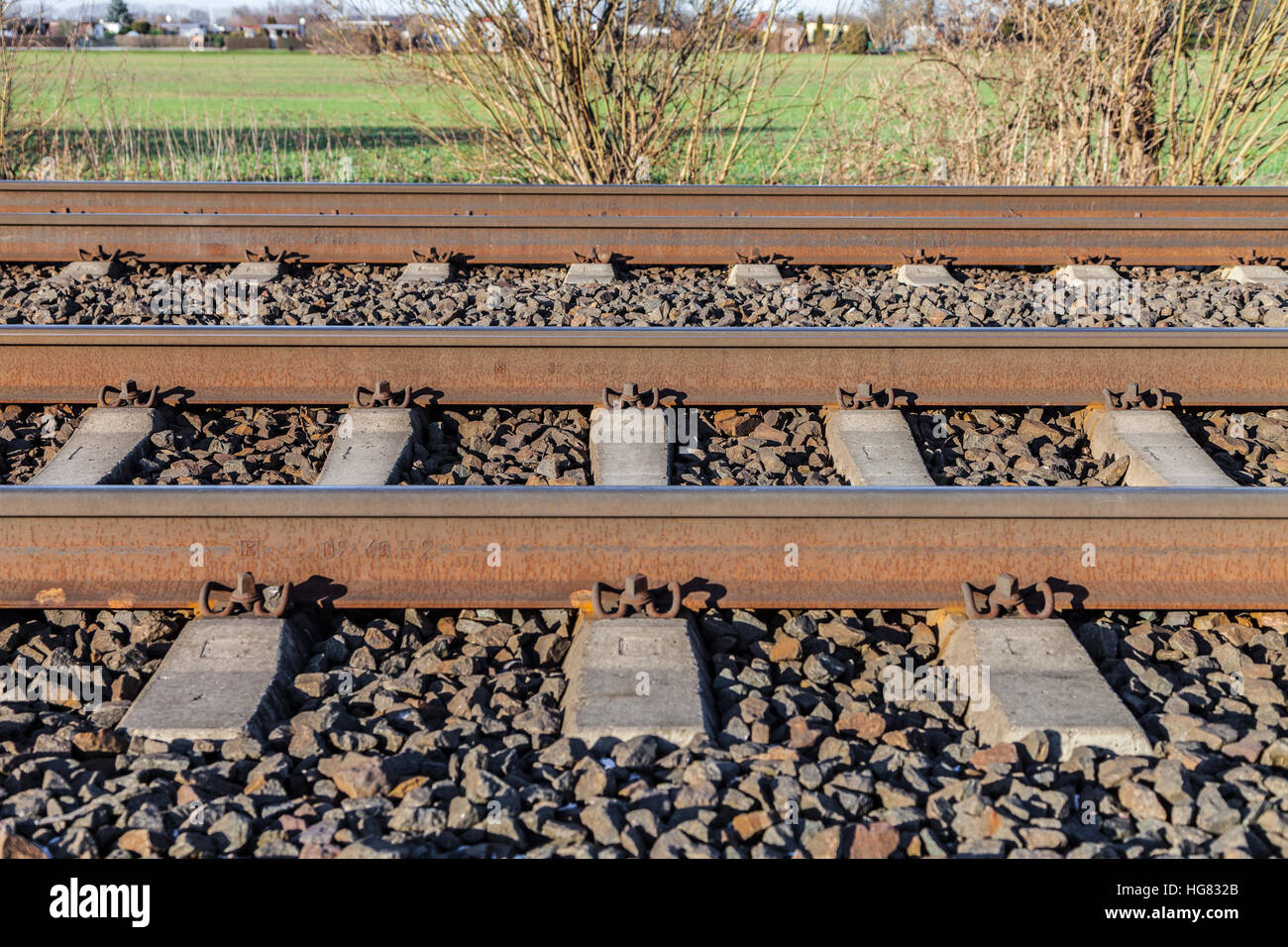 german rail road line lies on stones Stock Photo