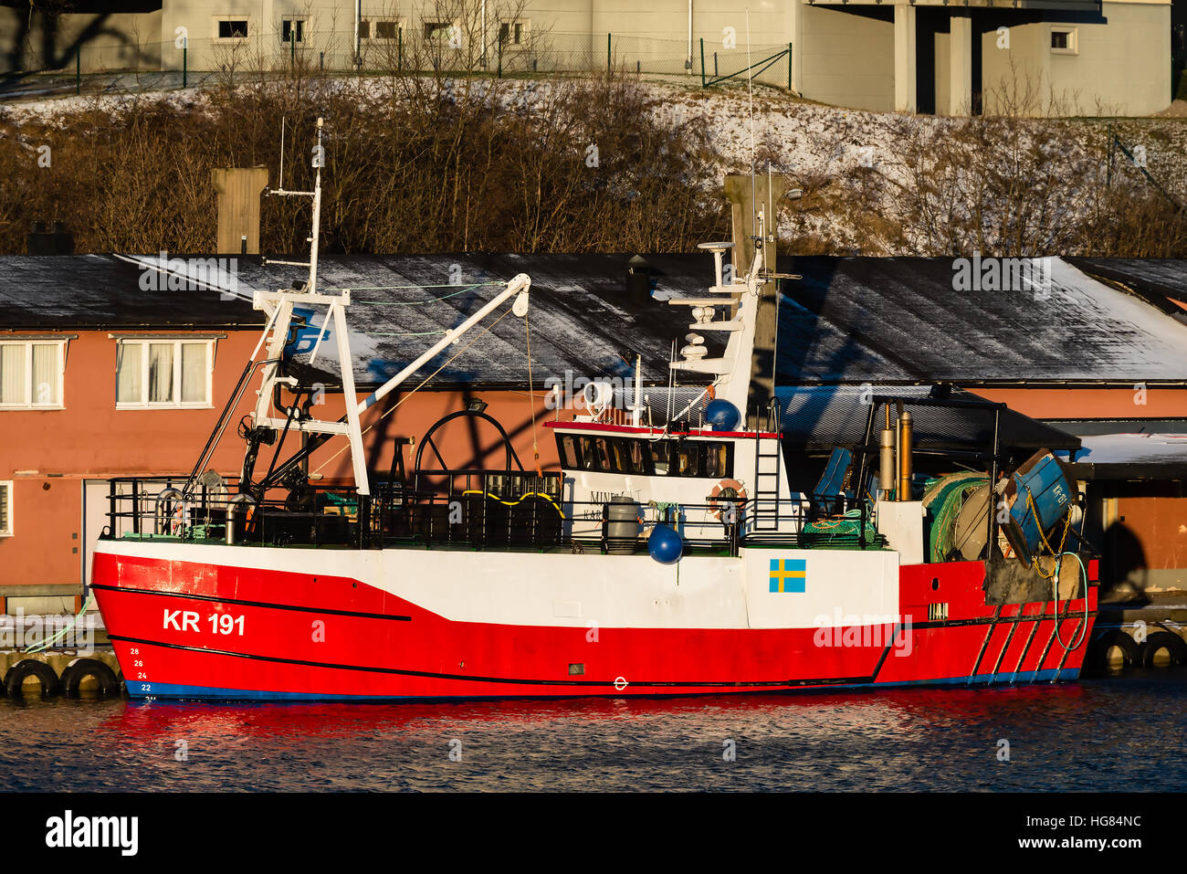 Karlskrona, Sweden - January 5, 2017: Documentary of fishing industry. The fishing boat KR 191 Mindy moored dockside in Saltö harbor, Karlskrona. Indu Stock Photo
